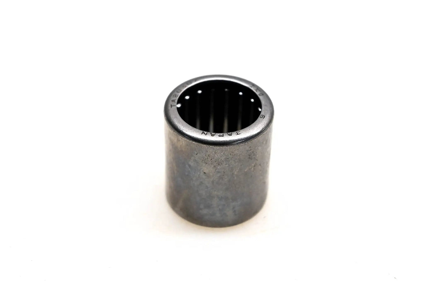 IKO TA2030Z Shell Type Needle Roller Bearing 20x26x30mm, front view showing metal shell and needle rollers.