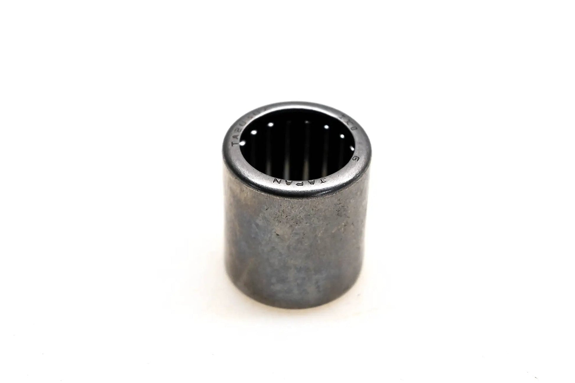 IKO TA2030Z Shell Type Needle Roller Bearing 20x26x30mm, front view showing metal shell and needle rollers.