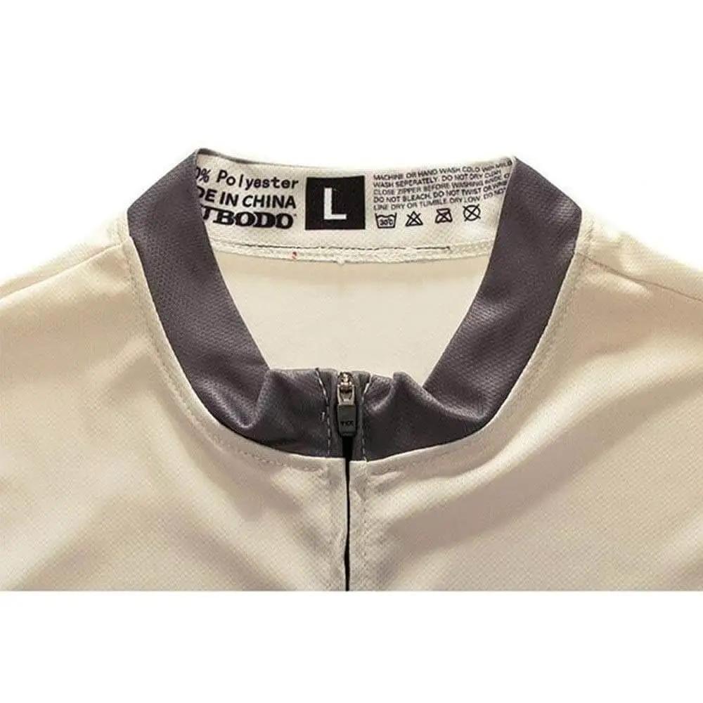 Close-up of a beige jacket collar with zipper and label showing size L and care instructions
