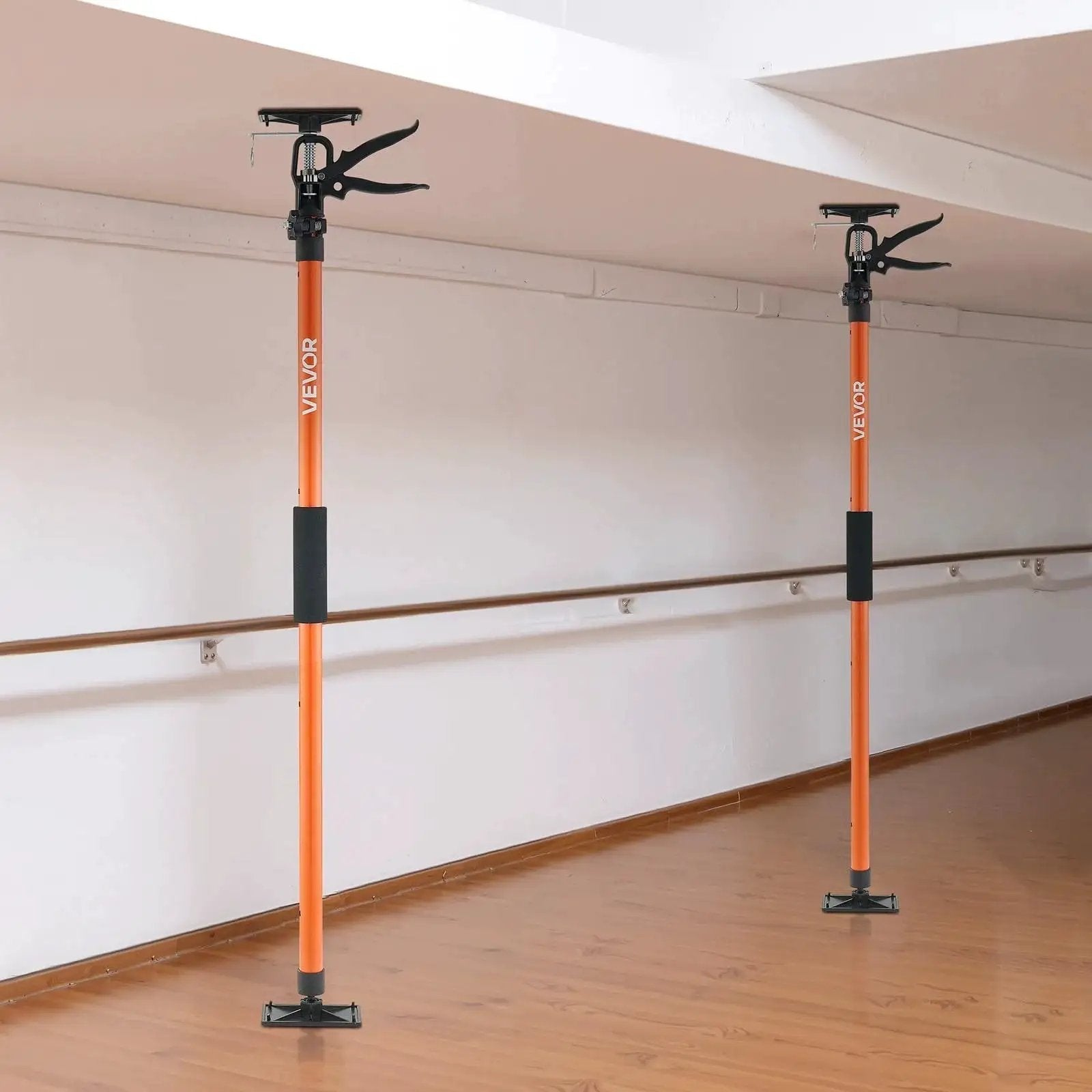 Installed Cabinet Support Pole 8 Pack Telescoping 45.7 to 114.2 Inches, 154 Lbs Capacity shown in a room with wooden flooring.
