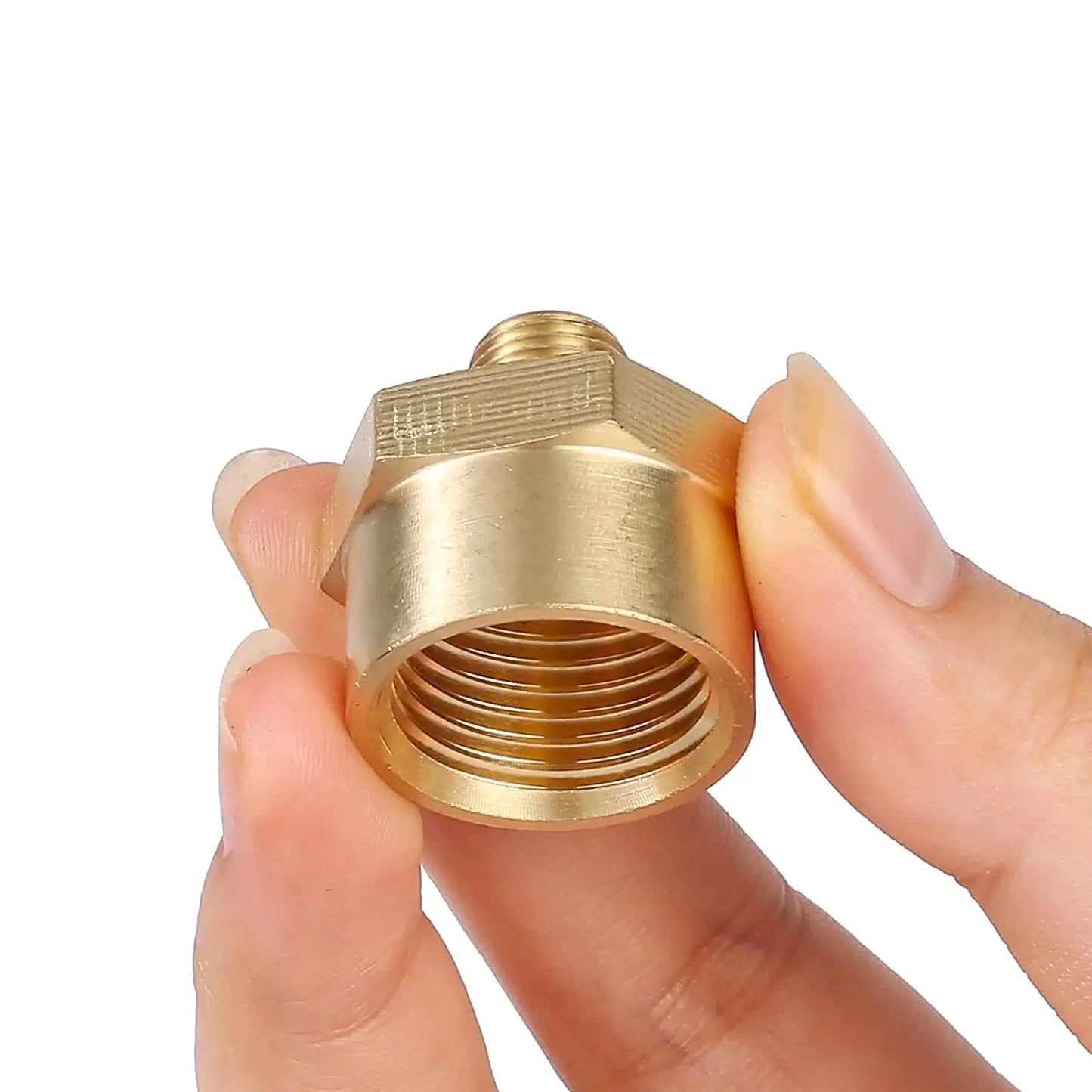 Close-up of Brass Pipe Fittings Reducer Adapter, 1/8 Inch Male to 1/2 Inch Female NPT Hex Bushing, held between fingers