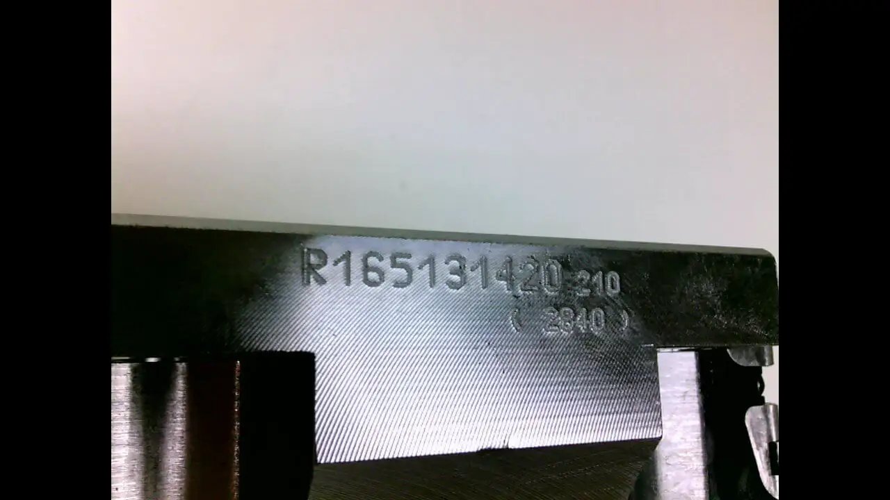 Close-up of serial number on Runner Block 35mm Linear Slide Carriage, Precision Guide for Rail Systems, Sealed Ball Bearing Compatible