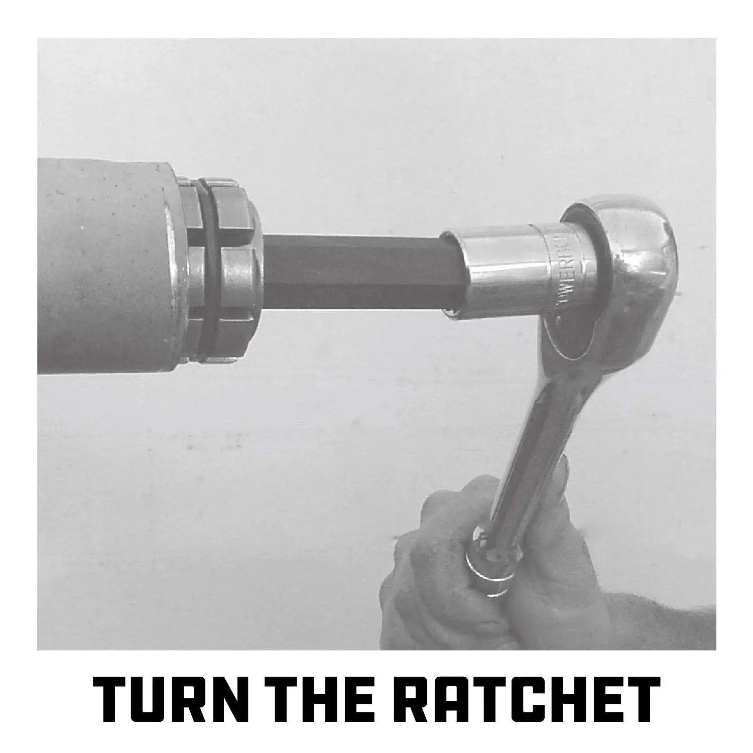 Using a Tailpipe Expander Fits One Eighth To One And Three Quarters Inches Exhaust Pipe with ratchet tool in garage.
