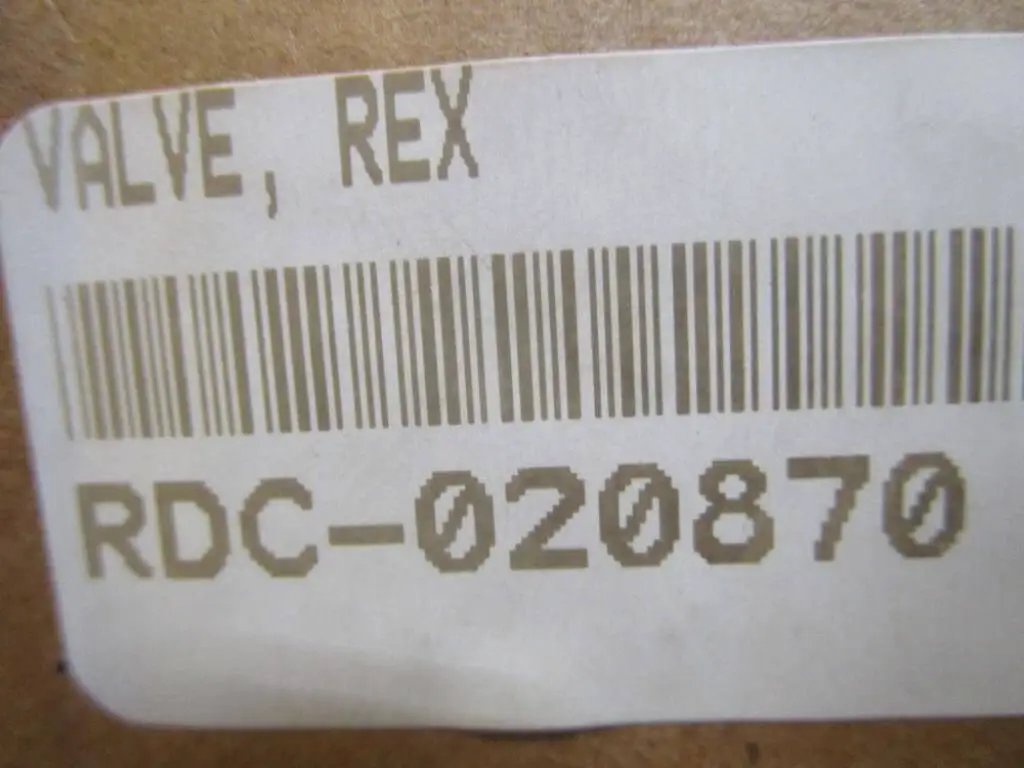Barcode labeled 'VALVE, REX' and 'RDC-020870' on cardboard packaging for the directional control DB15G252/350 single unit 00730196.