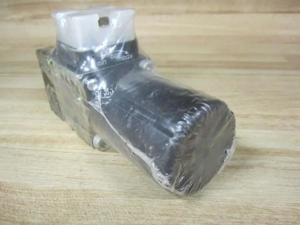 Side view of Hydraulic Solenoid Valve HED 8 OA 20/50 K14 S/V/12 R901110147 in packaging, industrial replacement unit.