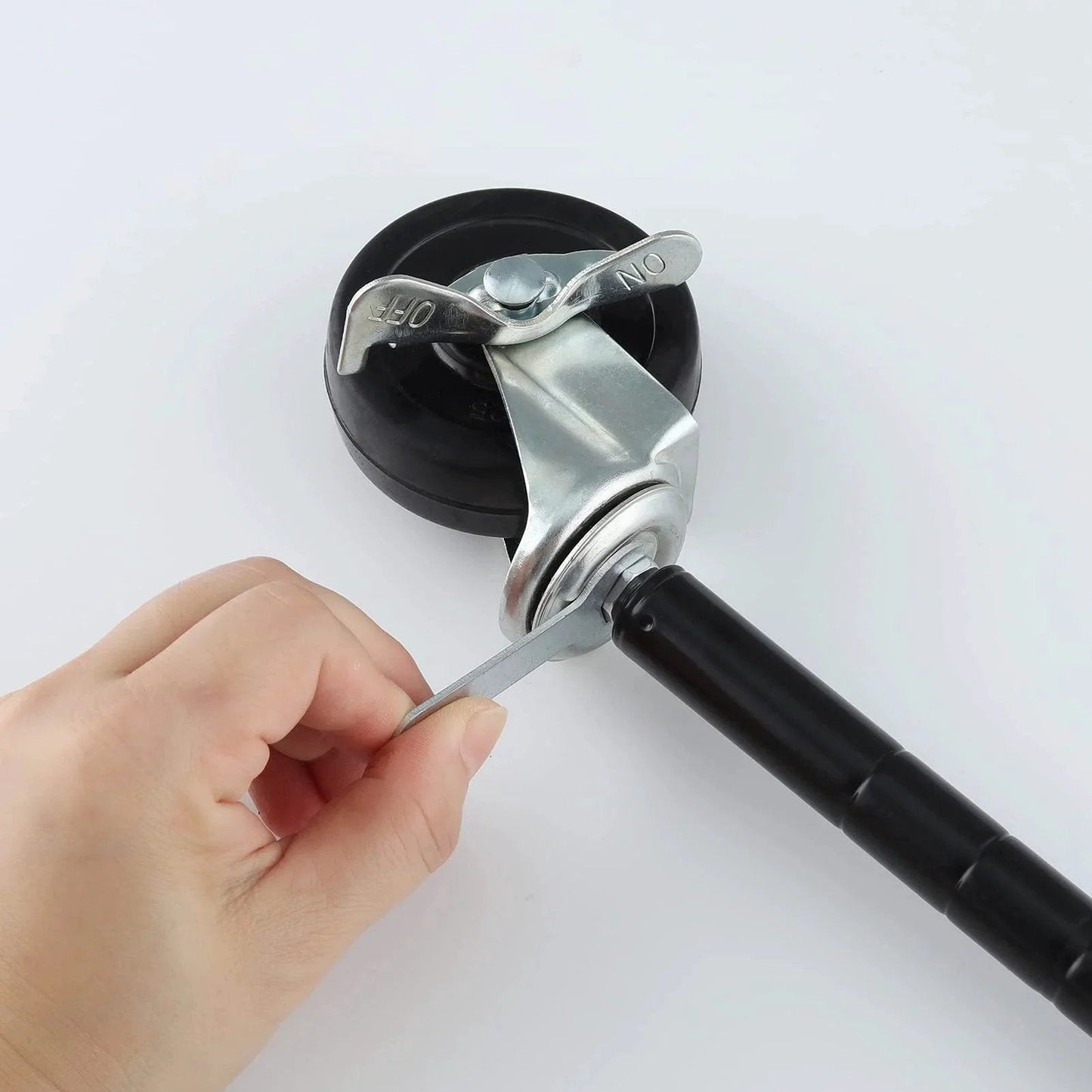 Hand adjusting brake on Two Inch Heavy Duty Caster Set of Four with Rubber Stem Wheels for Wire Shelving, one quarter inch stem