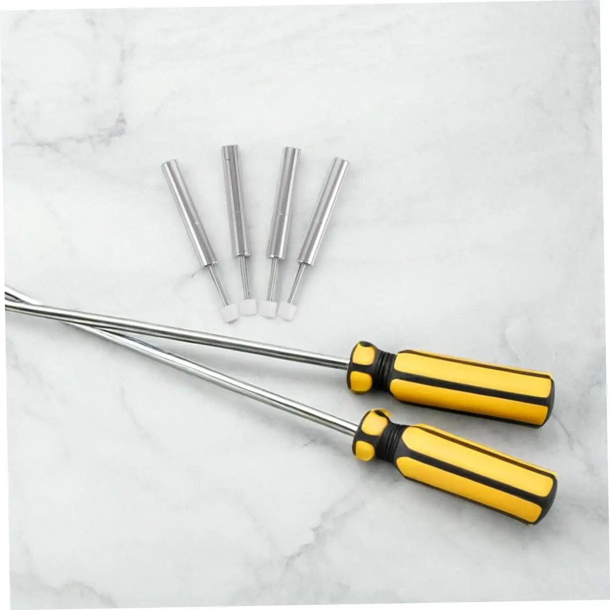 Yellow and black screwdrivers with four metal rods on marble surface