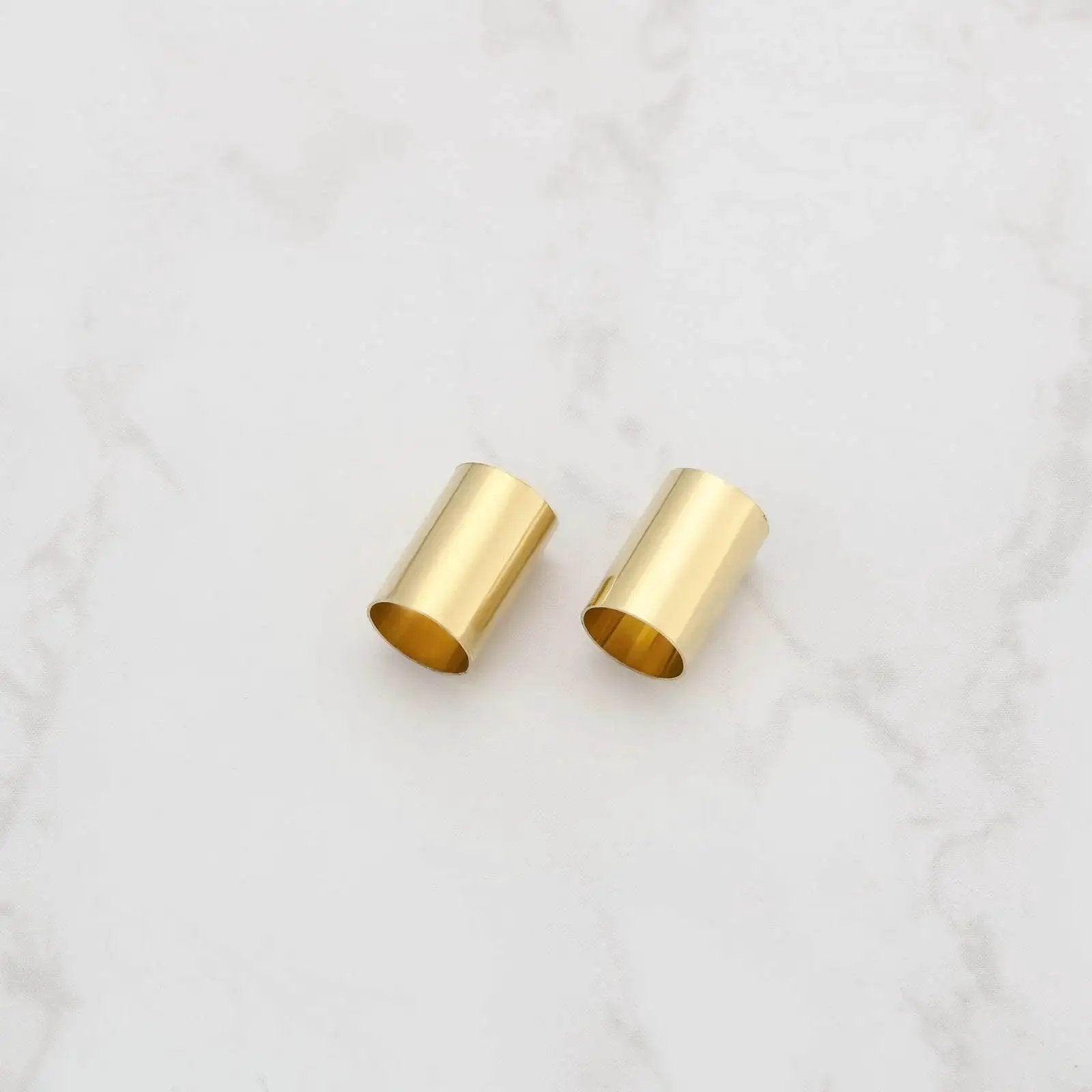 Guitar Brass Pot Sleeves 10 Pcs 6.35 Mm Outer 6.04 Mm Inner 9.5 Mm Length shown on white surface
