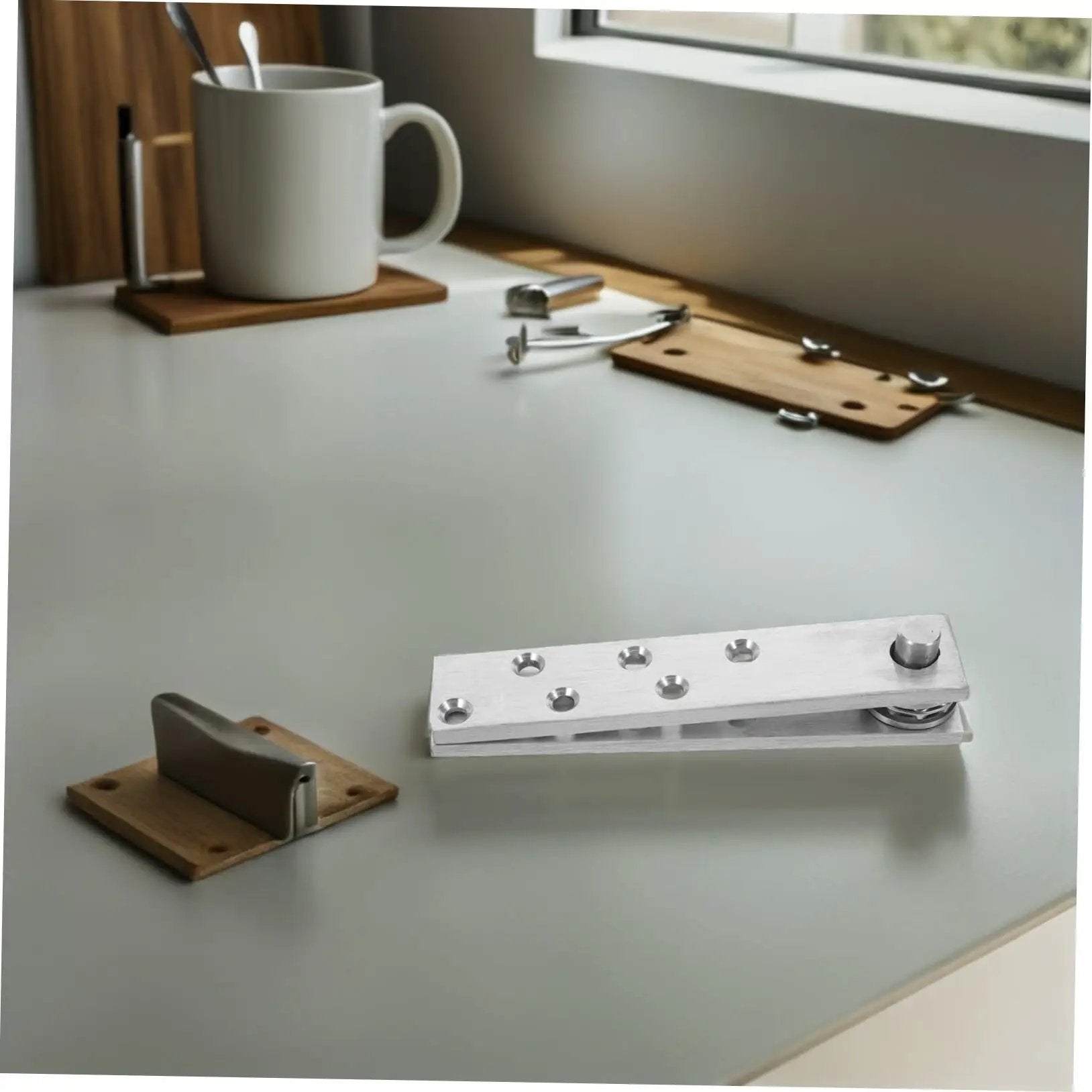 Hideaway Heavy Duty Stainless Steel Hidden Door Pivot Hinges for solid wood doors on a desk