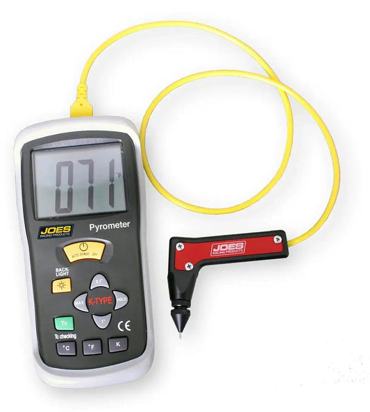 Racing Pyrometer With Adjustable Probe Backlit LCD 1800F Celsius Enabled displaying temperature with attached yellow probe.
