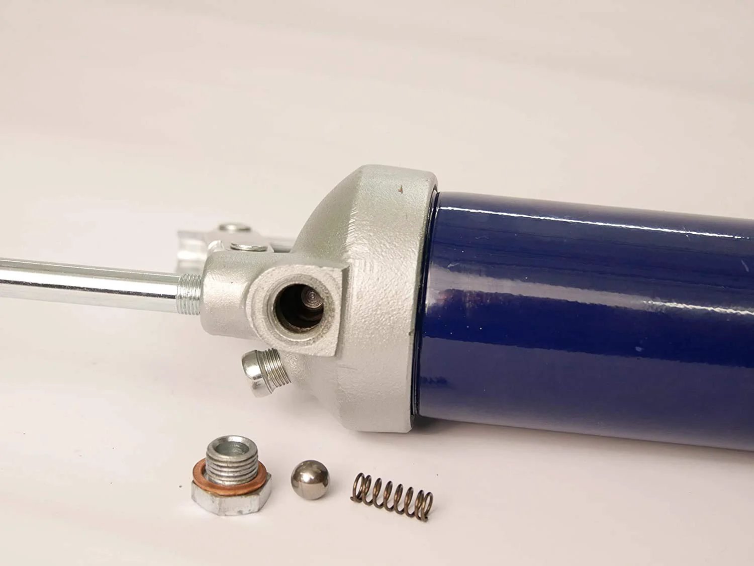 Side view of Heavy Duty Lever Action Grease Gun From Lincoln With Cast Iron Pump Head 10000 PSI, showing extension and coupler.