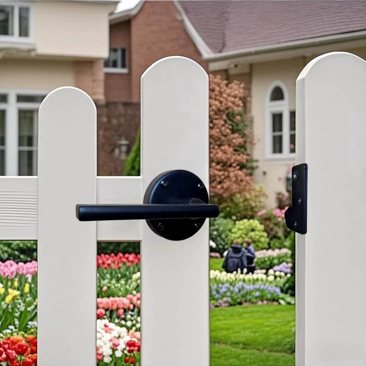 Double Sided Gate Latch for Wooden Fence And Wood Gate Heavy Duty Swinging Door Latch installed on white fence near garden