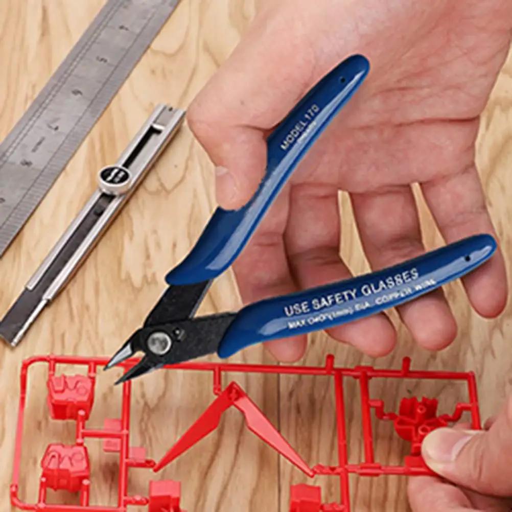 2 Pc Dark Blue Wire Cutter Set With Flush Cutters And Diagonal Pliers For Electronics Repair Jewelry Making DIY Projects, close-up of flush cutter in use.