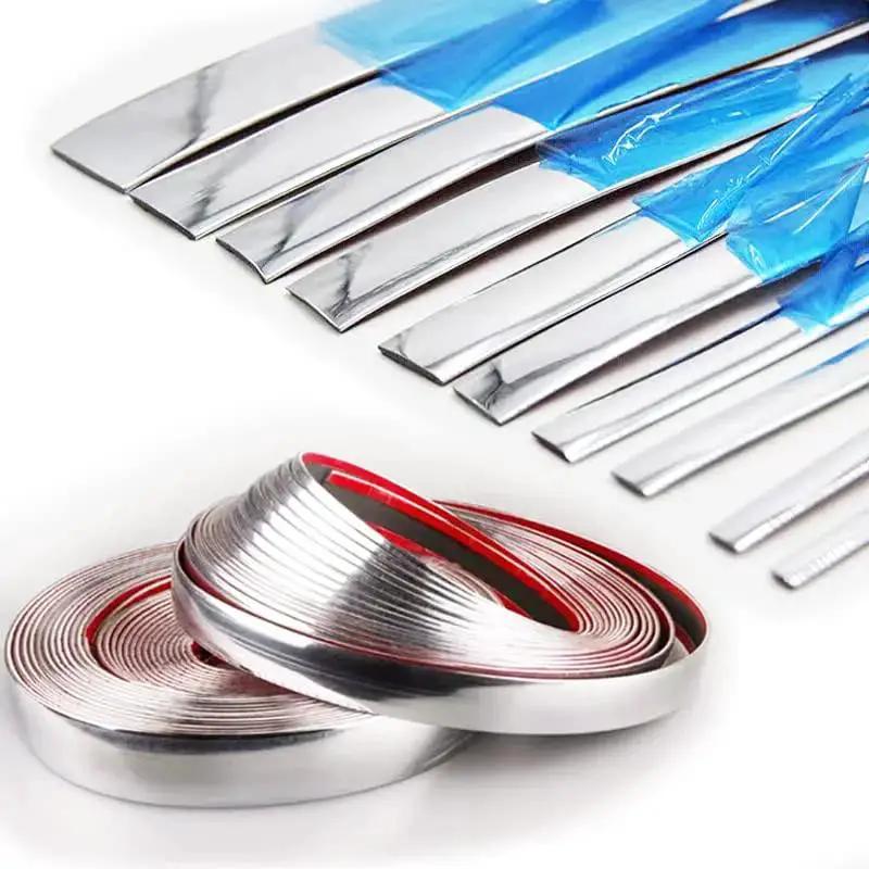 Universal Car Exterior And Interior Molding Trim Self Adhesive PVC Strip shown in rolled form and various cut sizes.