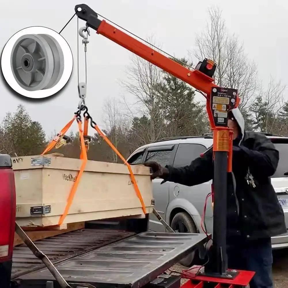 Beefy Cast Iron V Groove Caster Wheel With Straight Roller Bearing, 6 Inch Diameter, 2 Inch Wide, 1000 Lbs Capacity, shown lifting a crate.