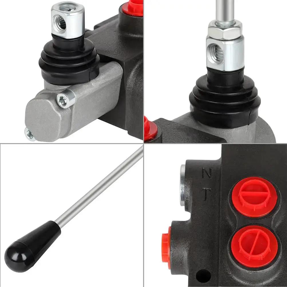 Close-up of hydraulic flow control valve with one spool for small tractors and loaders, showing lever handle and port details.