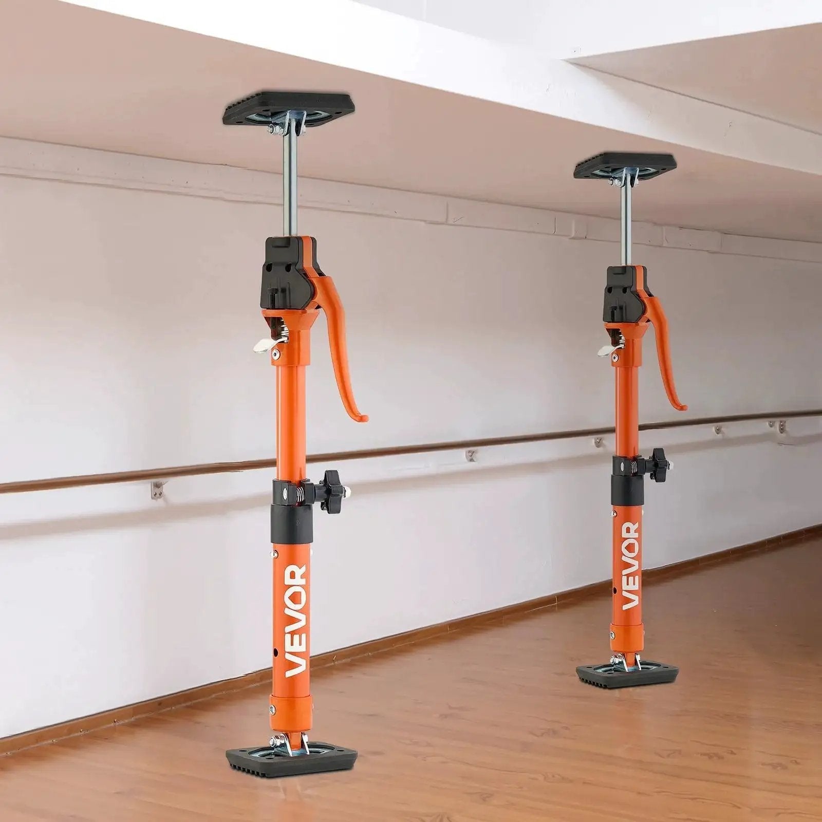 Two Telescoping Cabinet Jack Support Poles 2-Pack, 15.75-23.6 Inches 220 Lb Capacity, orange color, installed under ceiling