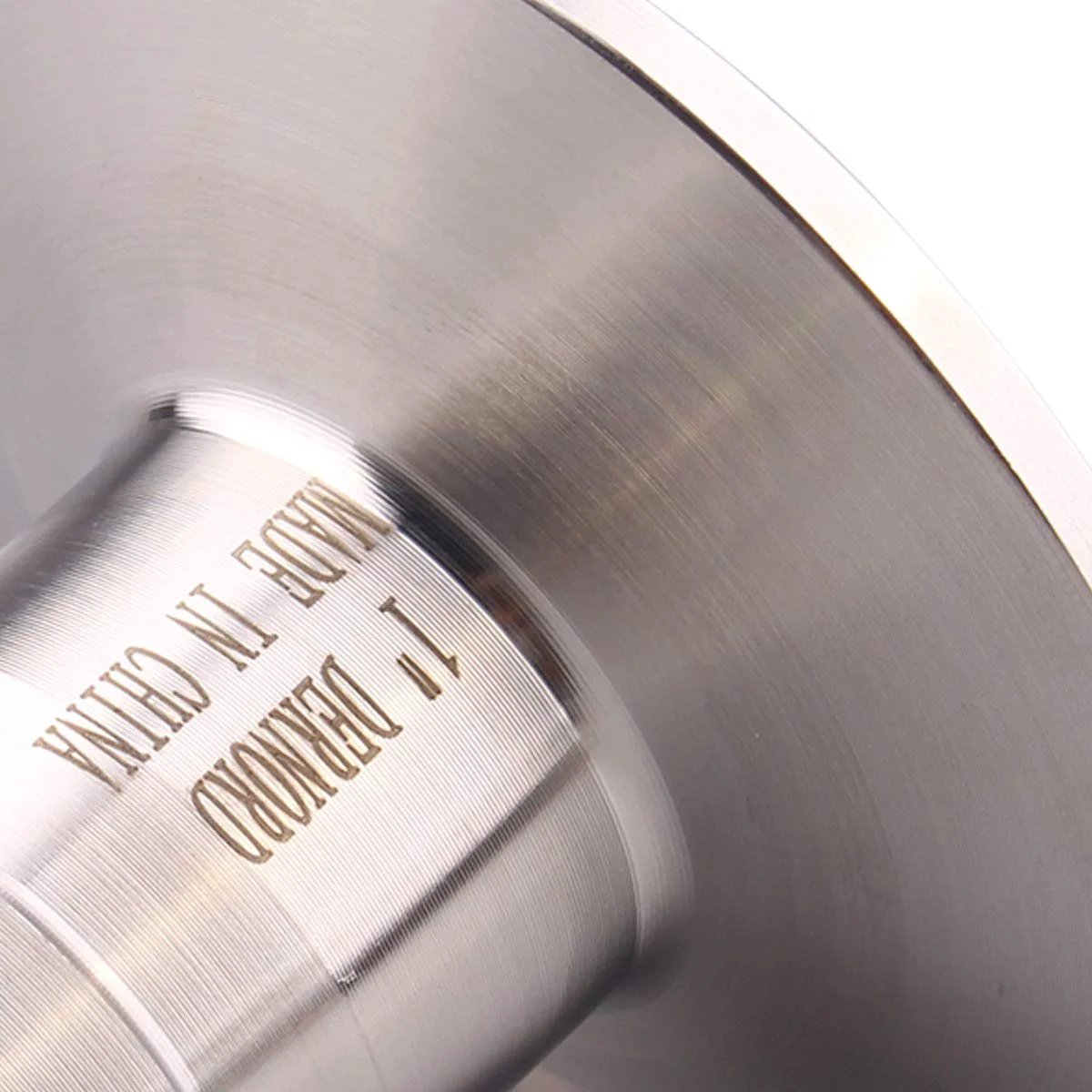 Close-up of 2 Inch Tri Clamp to 1 Inch Hose Barbed Adapter SUS304 Stainless Steel Sanitary Fitting with visible engravings