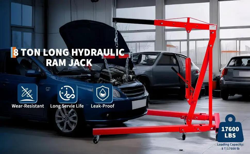 8 Ton Long Ram Hydraulic Jack With Clevis Base And Air Pump For Engine Hoists in use with vehicle in workshop setting