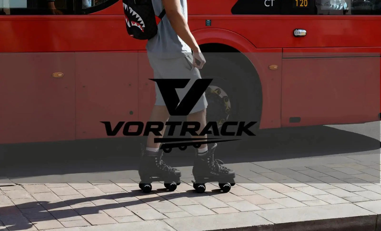 Person wearing quad roller skates with 78A Quad Roller Skate Wheels 65x36mm 8 Pack With ABEC 9 Bearings on a sidewalk near a red bus.