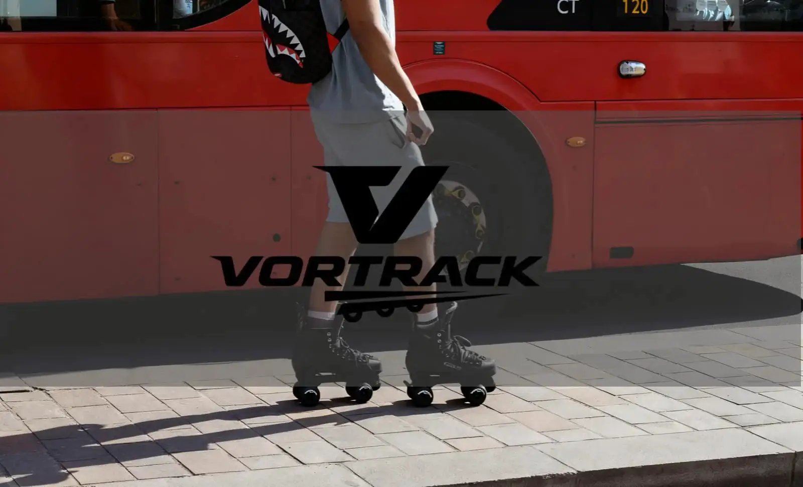 Person wearing quad roller skates with 78A Quad Roller Skate Wheels 65x36mm 8 Pack With ABEC 9 Bearings on a sidewalk near a red bus.