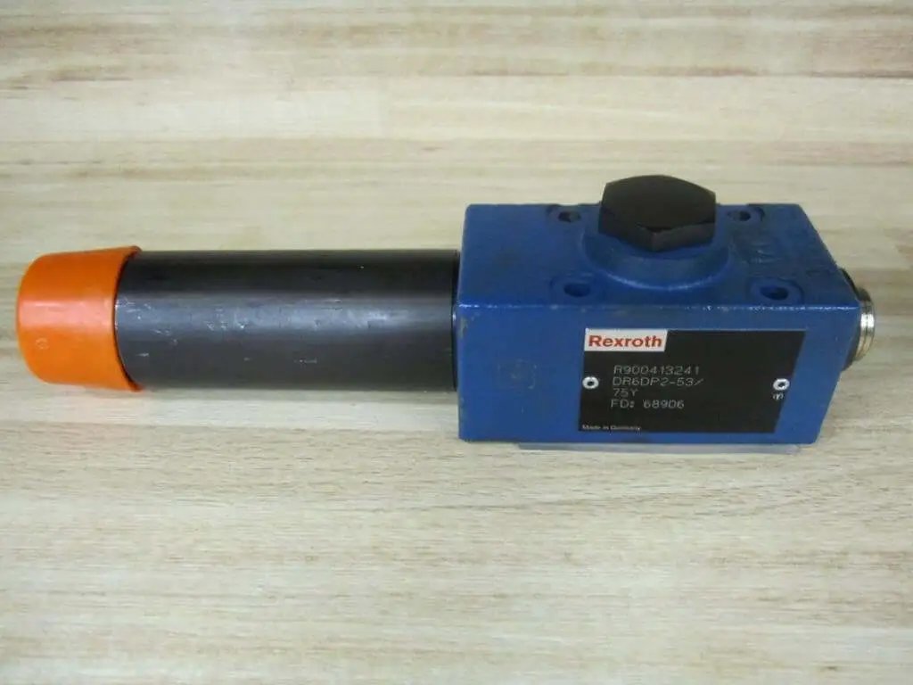 DR6DP2-53/75Y Pressure Reducing Valve Single Unit Direct Operated Size 6 with NBR Seals visible on a wooden surface