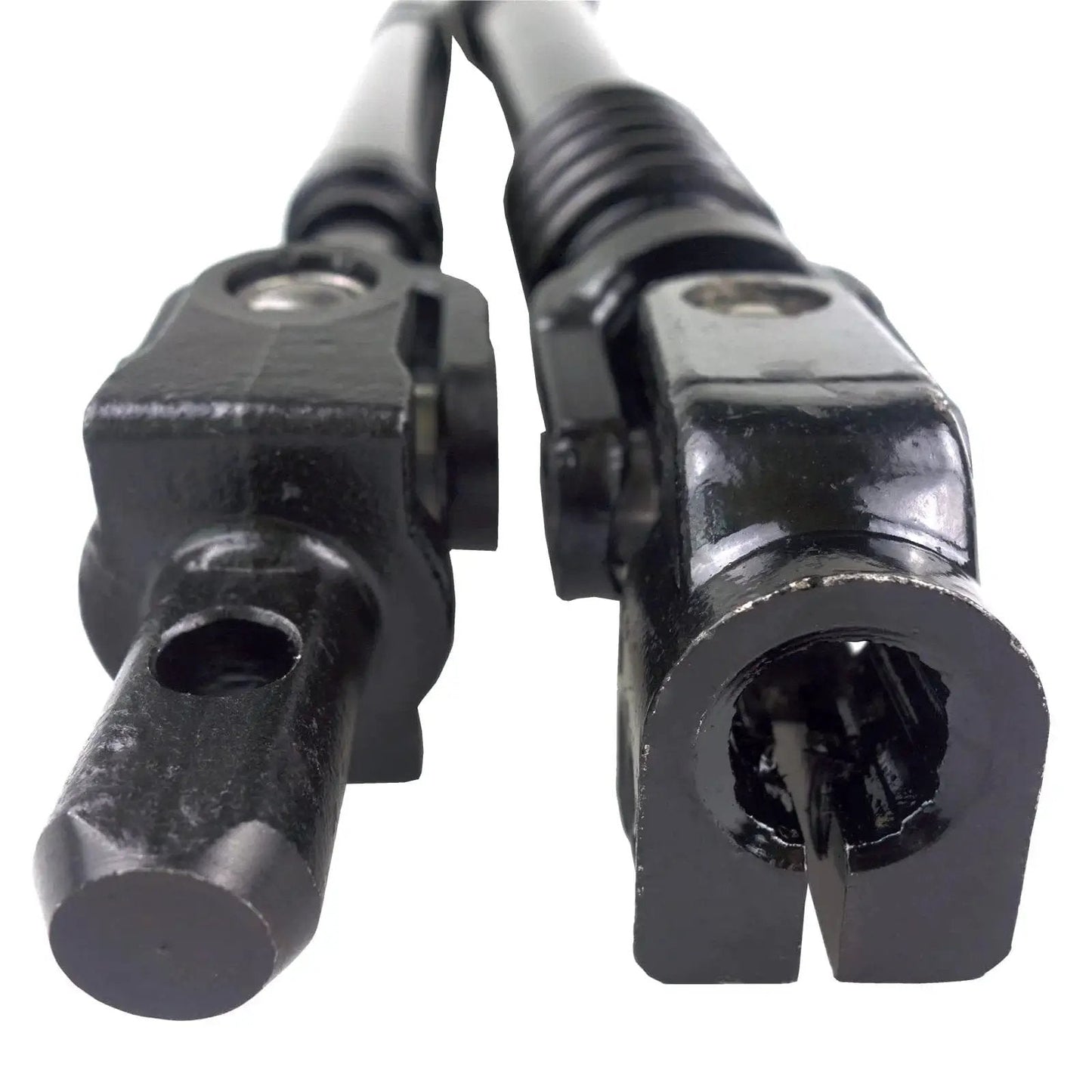 Close-up of upper and lower steering shaft with bearing for Chevy Silverado Suburban Yukon, metal construction, black finish.