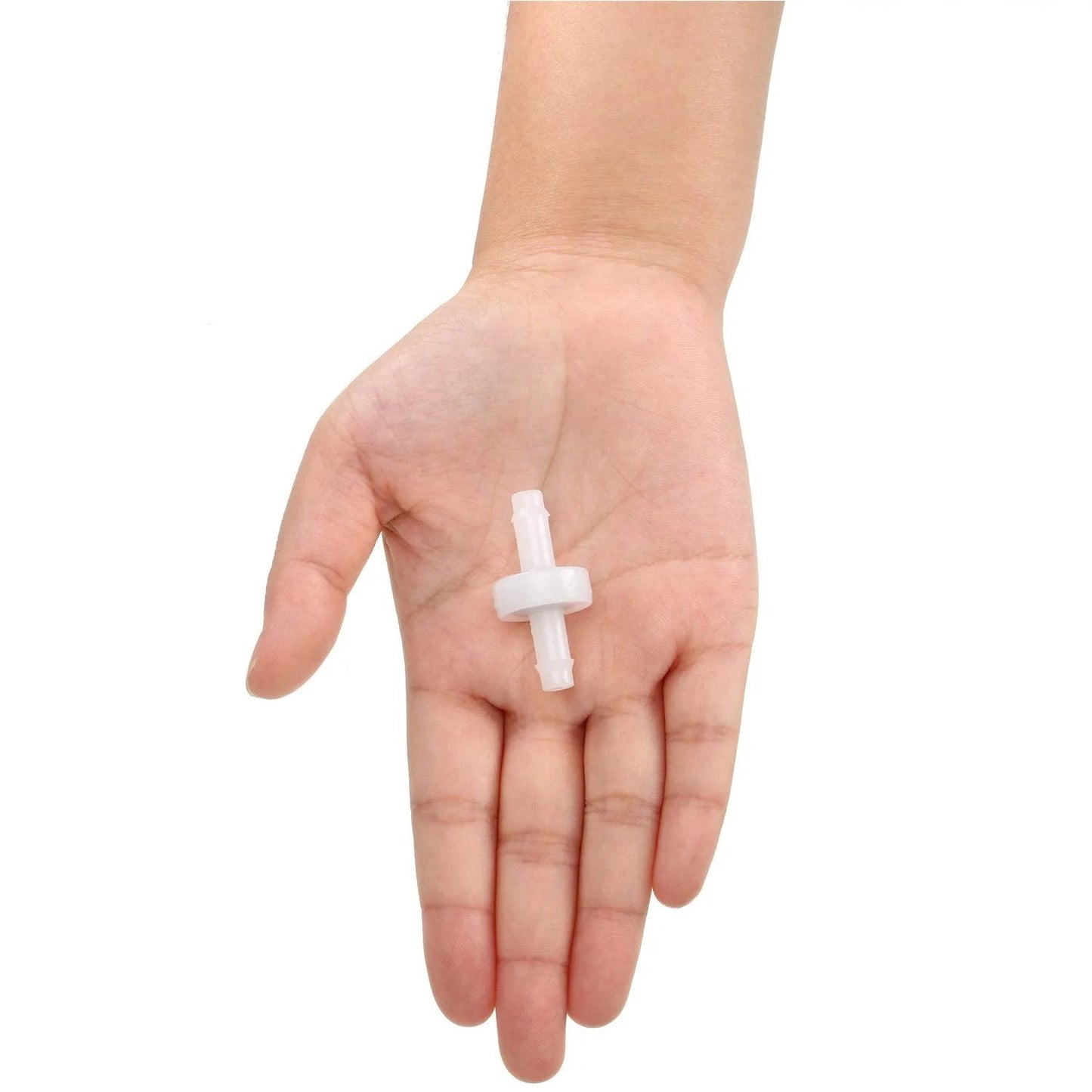 Person holding a single white PVDF check valve, part of Four Pack Quarter Inch PVDF Check Valve One Way Flow Blocker For Fuel Gas Water Air Lines