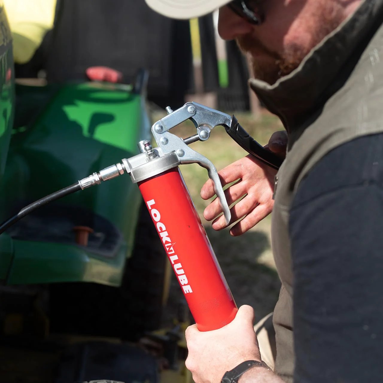 Heavy Duty Pistol Grip Grease Gun With Patented LockNLube Coupler Locks On And Does Not Leak, 20 Inch Hose With Inline Swivel, Red