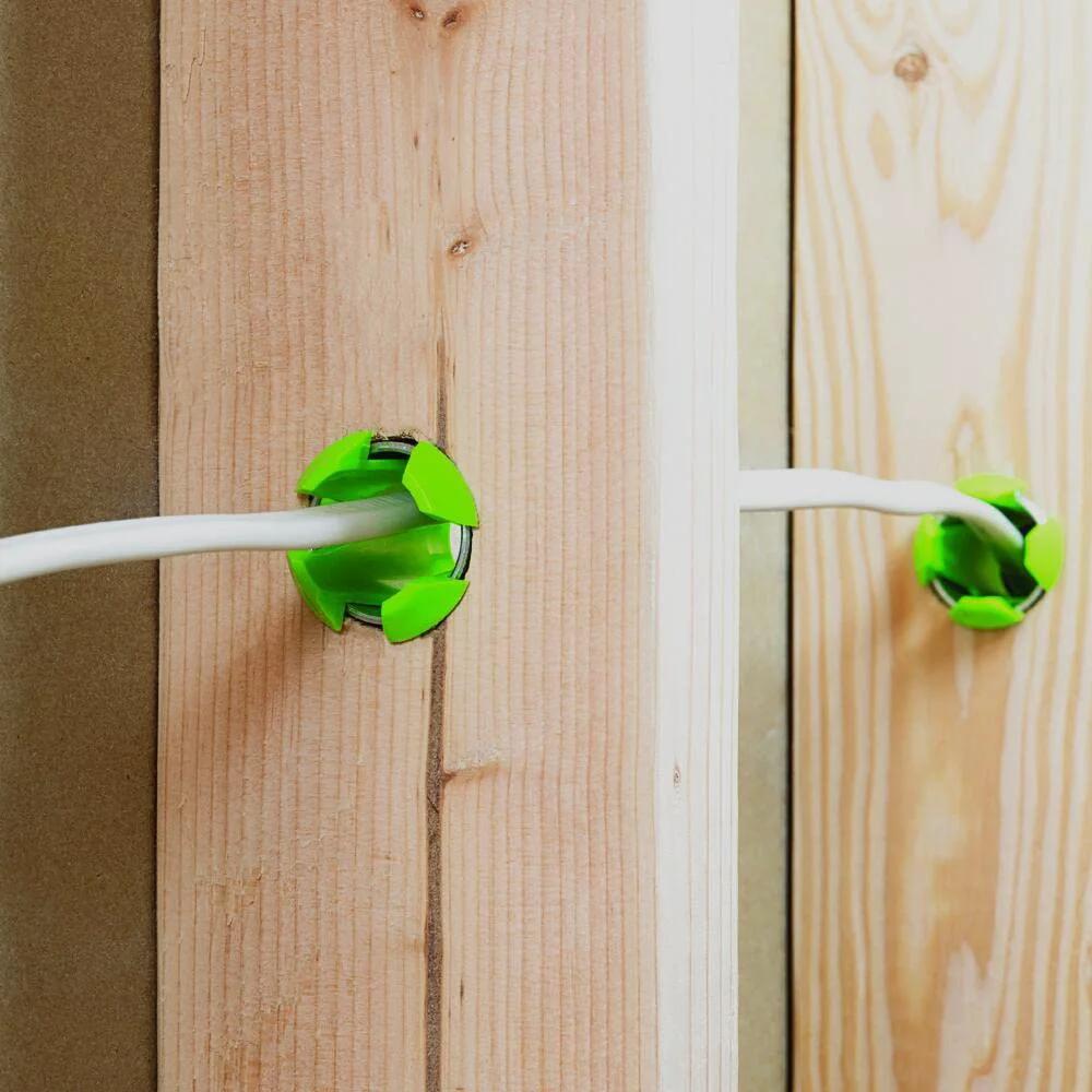 Stud Electrical Wire Protector 5 Pack for DIYers by EZ Guard 360 Degree Shield Against Nails Screws Drill Bits and Penetration Prevents Arc Fault Fires and Wire Damage in Stud Walls installed on wooden studs.