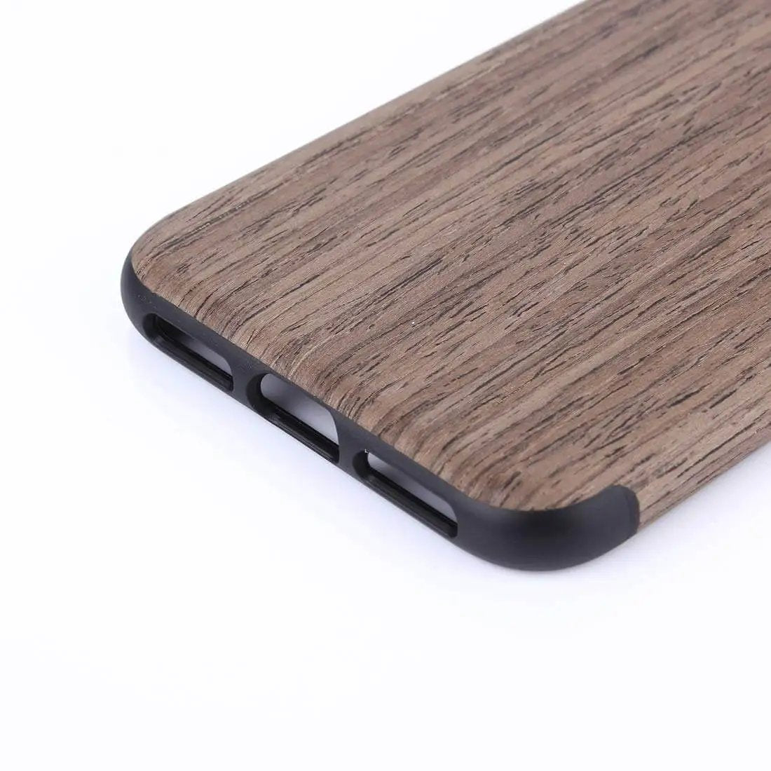 Wooden phone case close-up with dark accents and sleek finish, showcasing texture and durability