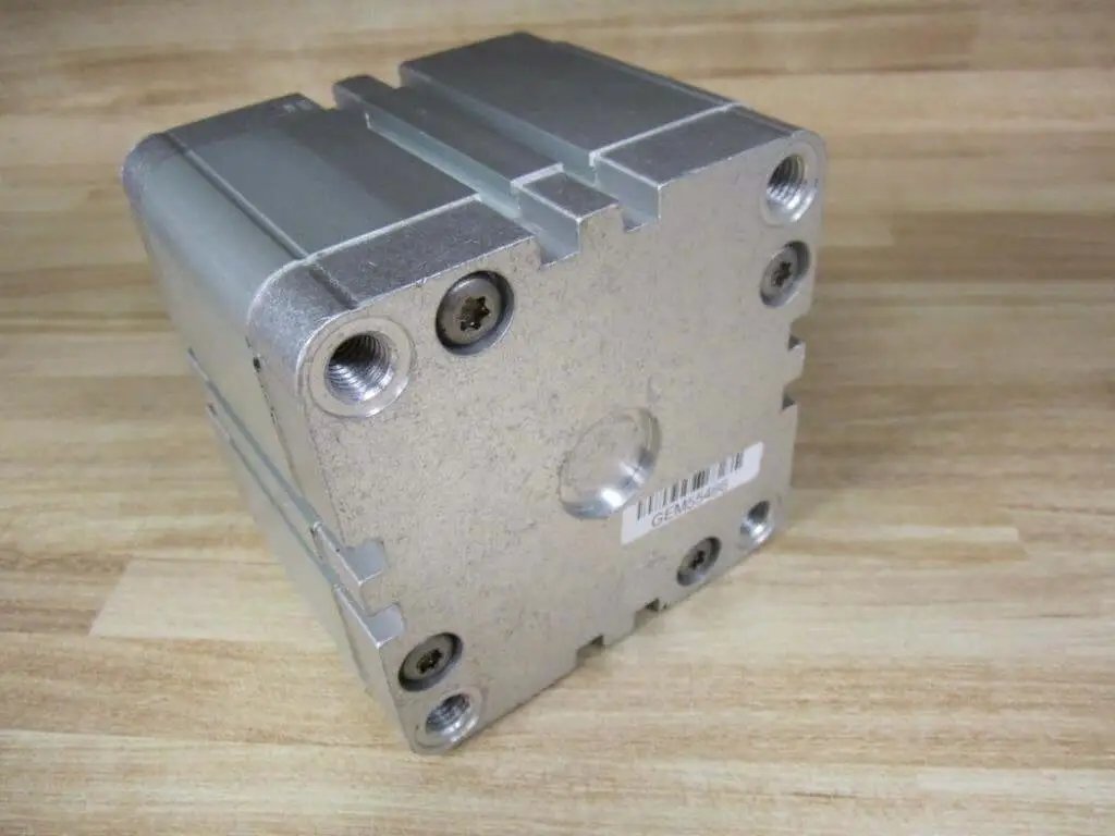 Bosch Rexroth Cylinder 0822-397-205 hydraulic cylinder showing NPT end threads on wooden surface.