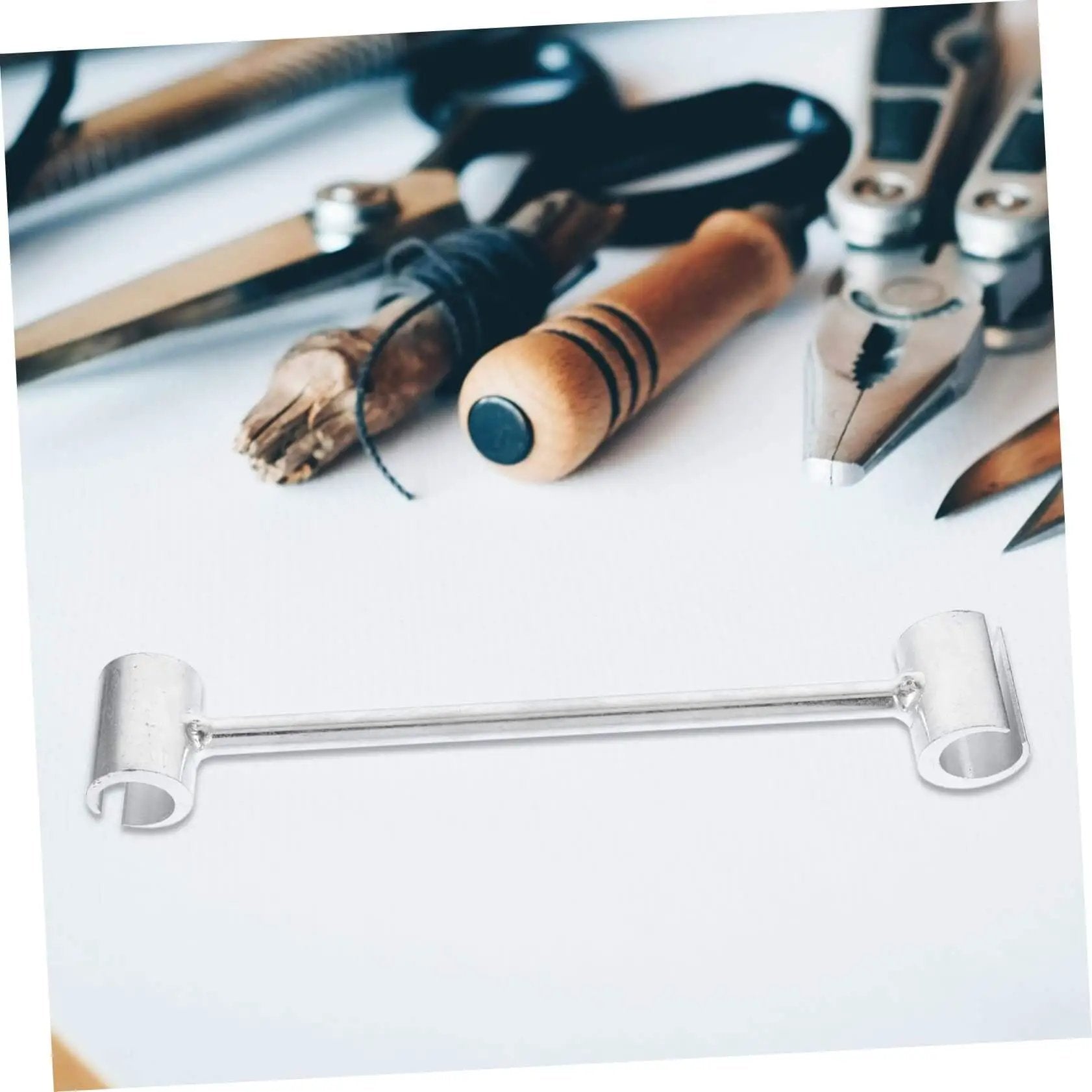 Door Hinge Gap Adjuster Kit for Precise Alignment and Easy Repair Universal Hinge Fix Tool Set with Heavy Duty Wrench shown on a workbench.