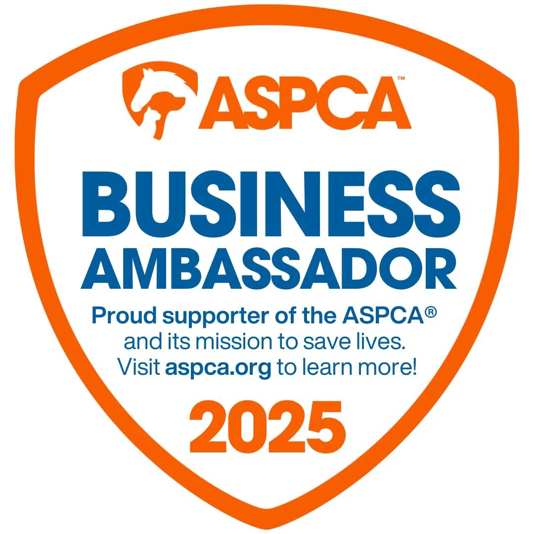 ASPCA Business Ambassador badge for proud supporter 2025, orange and blue emblem with animal silhouette and website link.