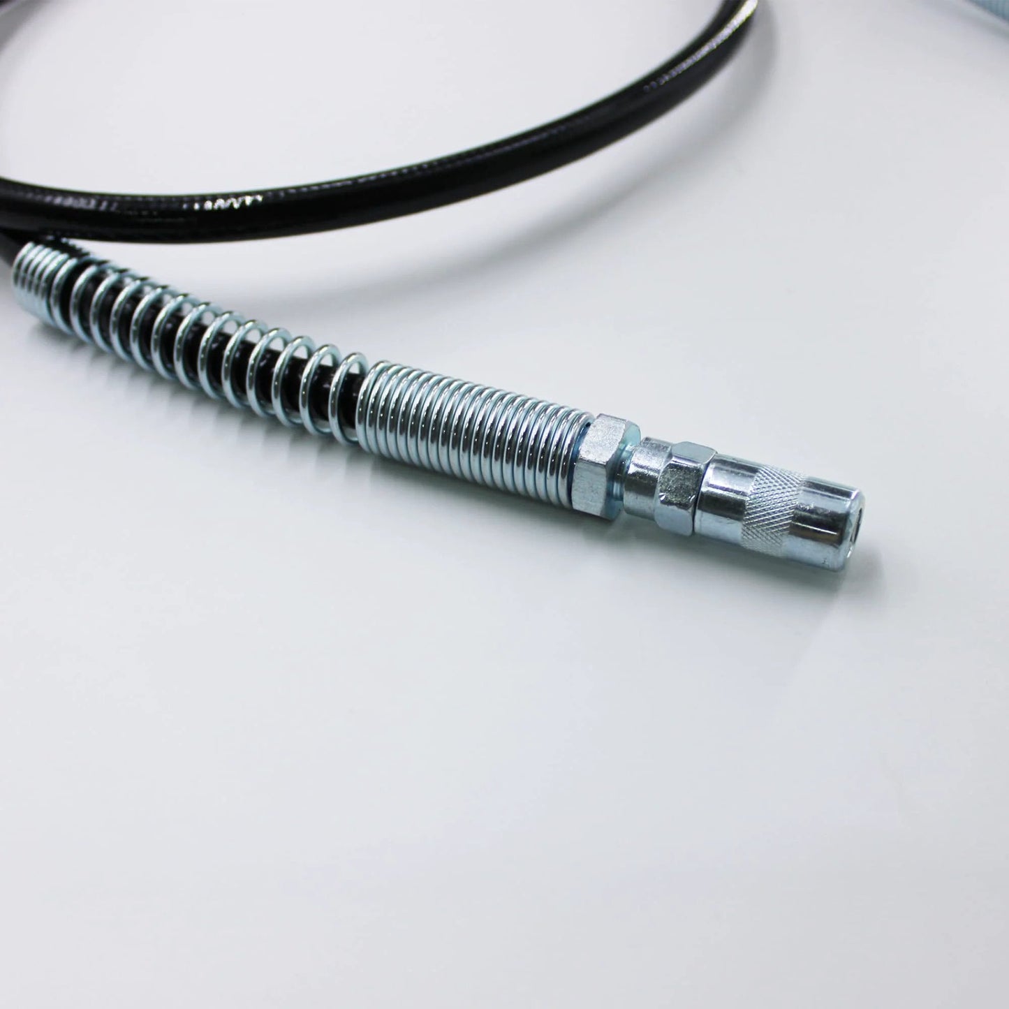 Close-up of 48-inch grease gun hose with coupler for Milwaukee M18 and M12, model 49-16-2647, compatible with 2446-20 and 2646-20.