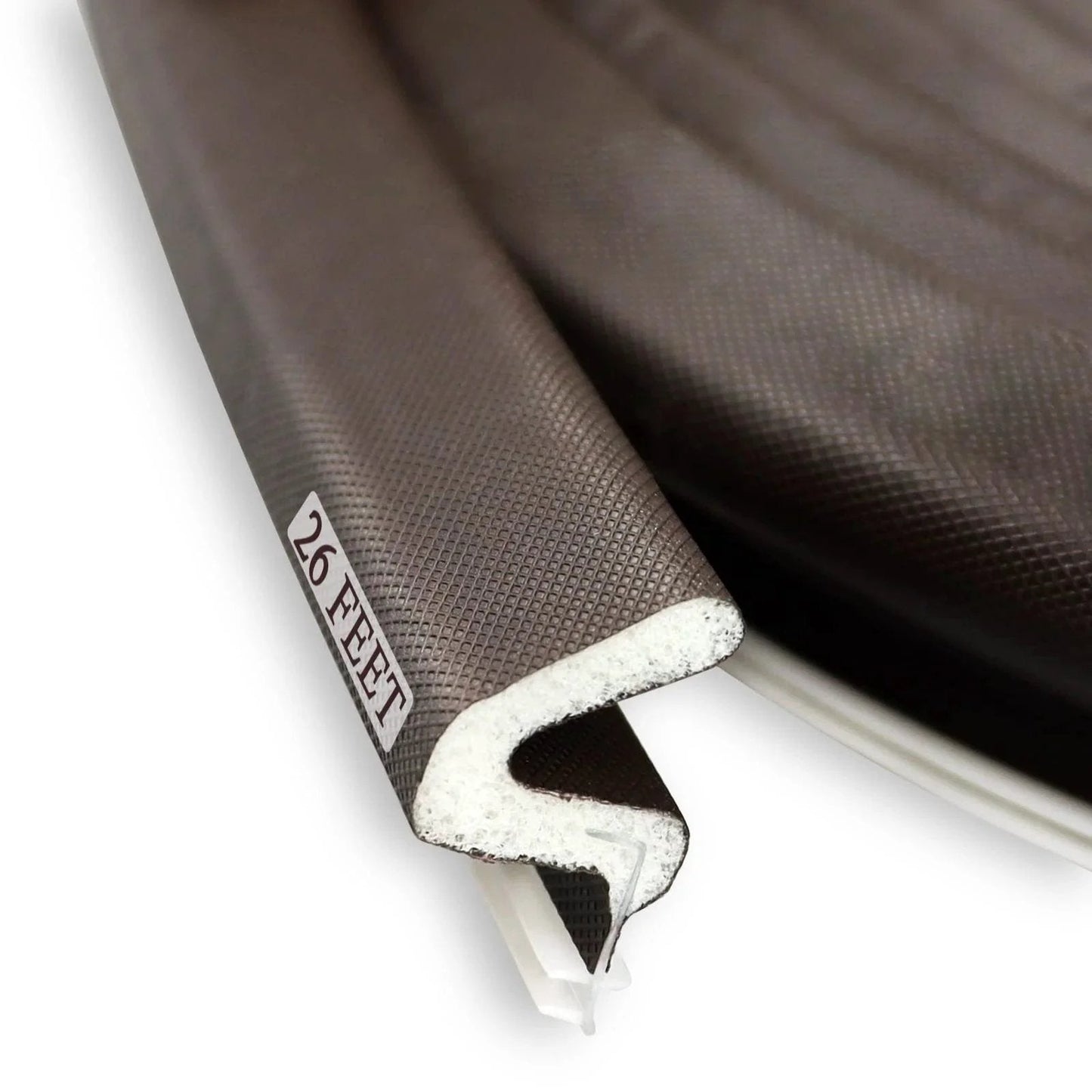 Close-up of Kerf Door Weather Stripping Seal 26 Ft Foam Weatherstrip With Slot Card Slot Installation, brown PU foam.