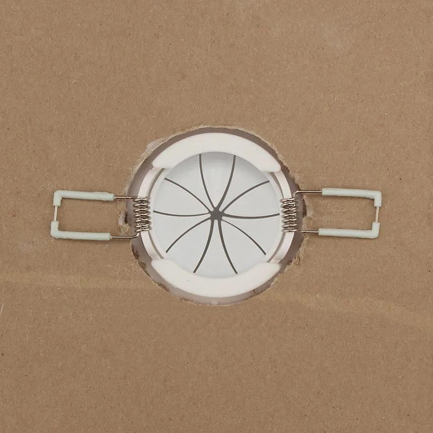 White Two Inch Cable Pass Through Port Pair With Spring-Lock, Durable Plastic Rubber Construction For Clean Cable Management installed