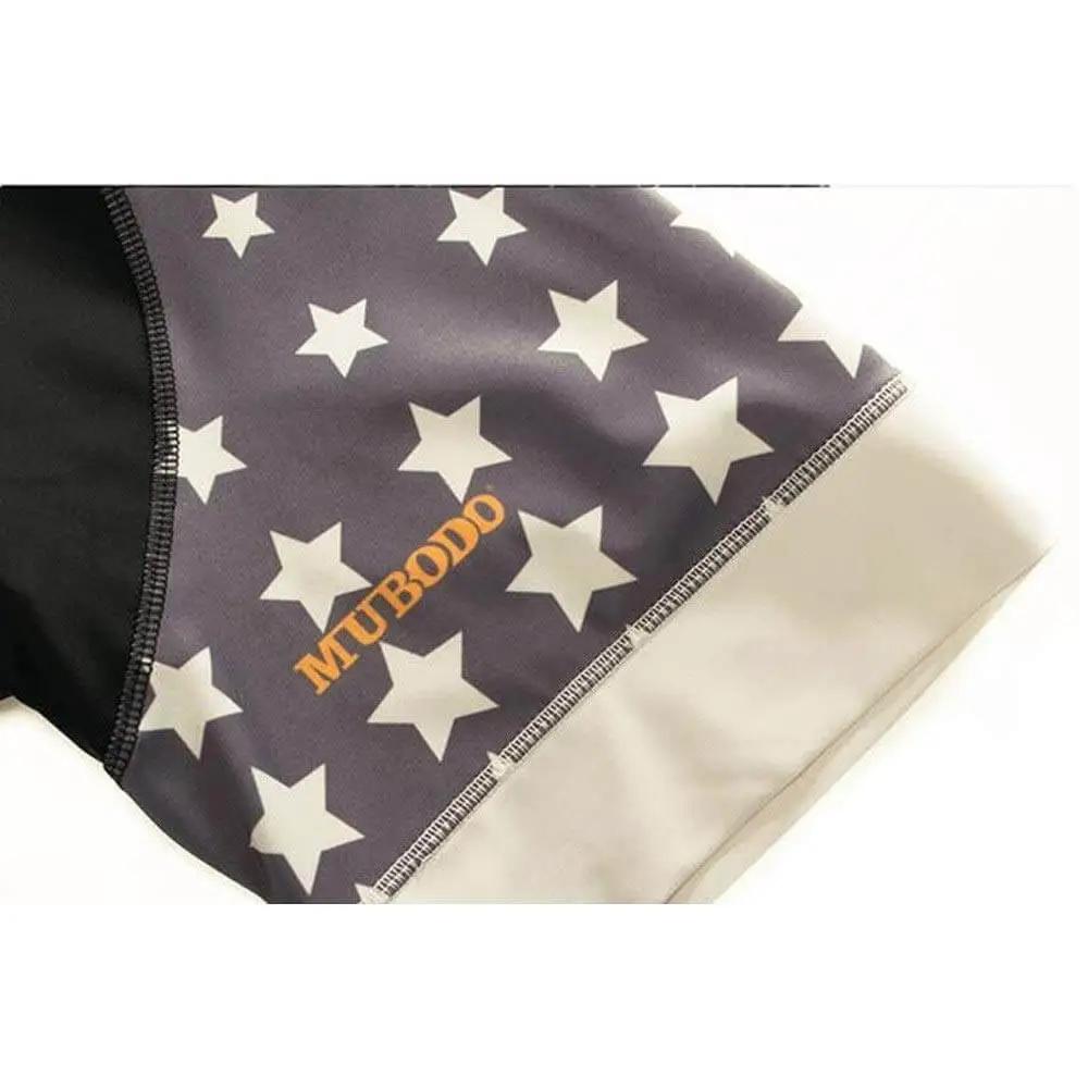 Cycling jersey with star pattern and orange 'MUBODO' branding detail, close-up view of sleeve stitching and design