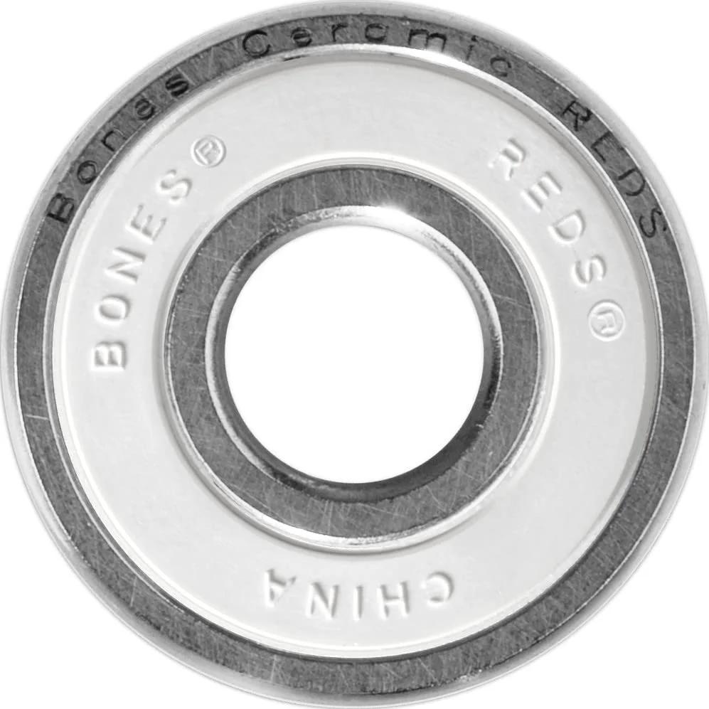 Close-up of Ceramic Reds Skateboard Bearings 8 Pack With High Speed Silicon Nitride Balls And Non Contact Rubber Shield by Bones