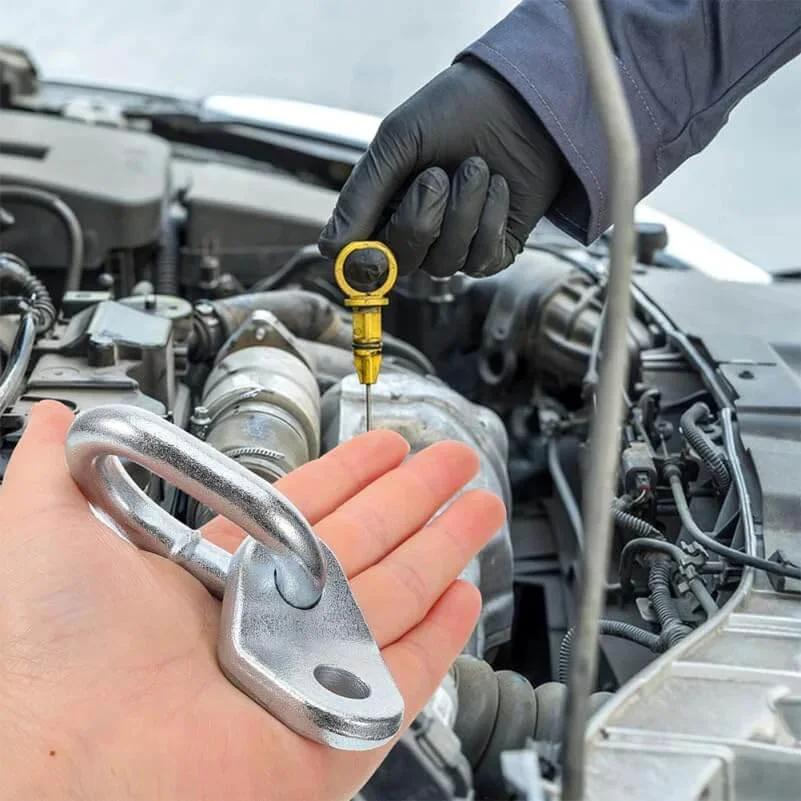 Two Piece Heavy Duty Stainless Steel Engine Lifting Rings With 5500 Pound Capacity Hoist Brackets shown beside car engine