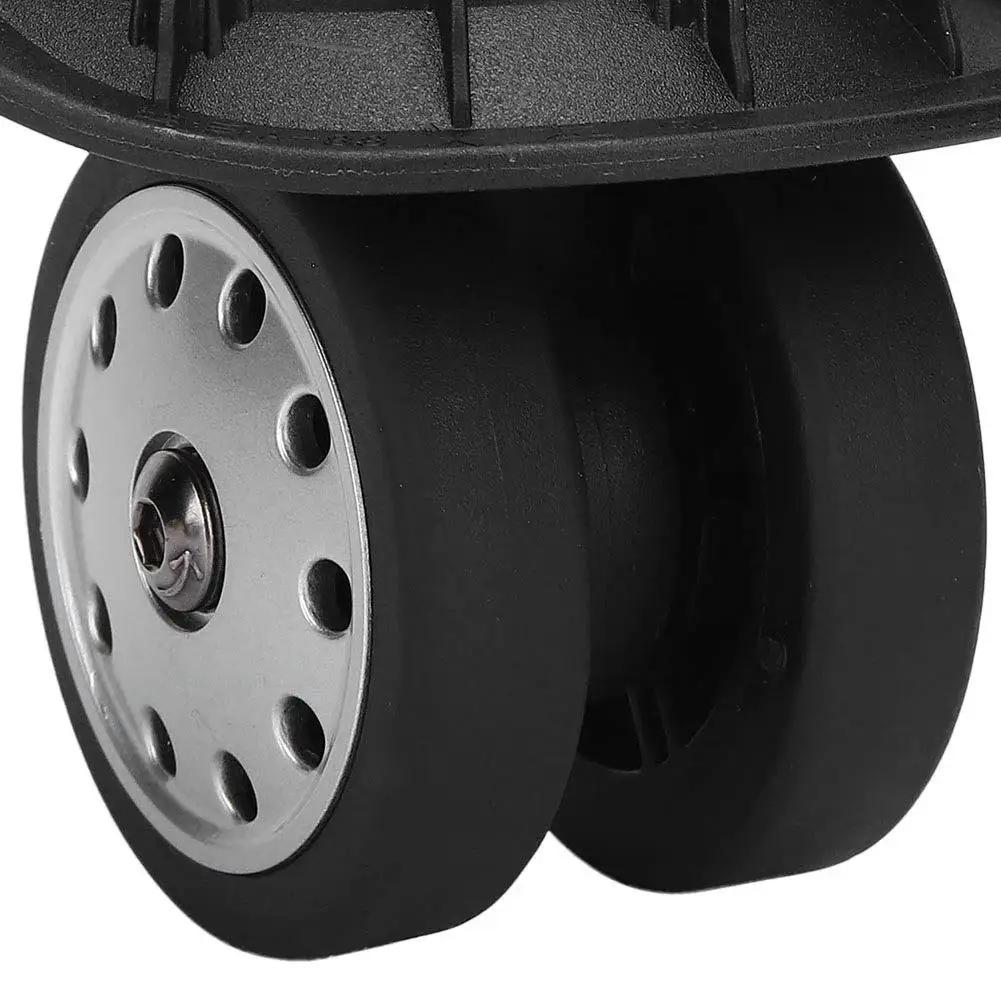 Close-up of Multihole Suitcase Wheel Set In Black Universal Luggage Replacement Wheels Pair With Braked Stop Function