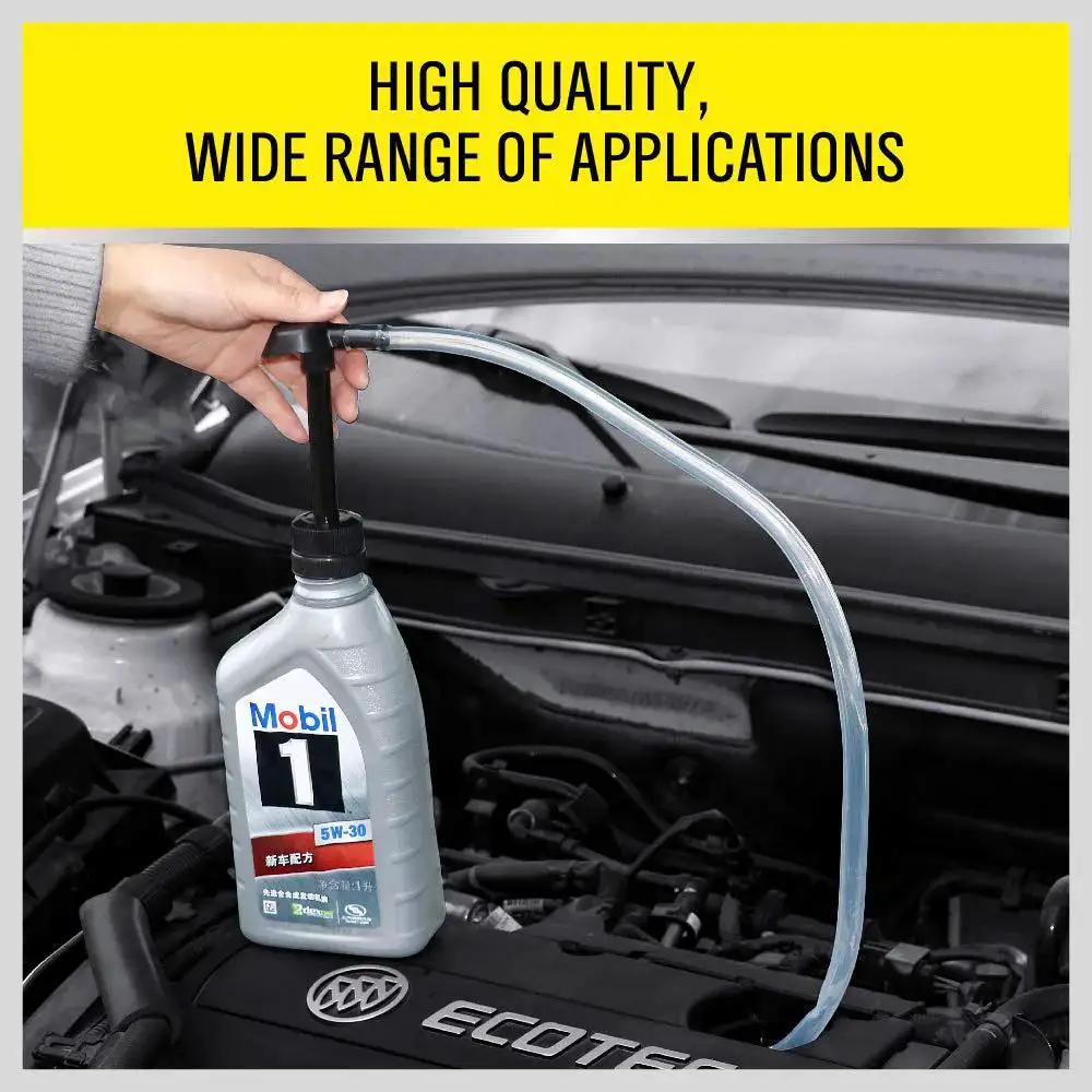 Hand Transfer Fluid Pump For Transmission Gear Oil And Differential Fluids in use with a Mobil 1 oil container.