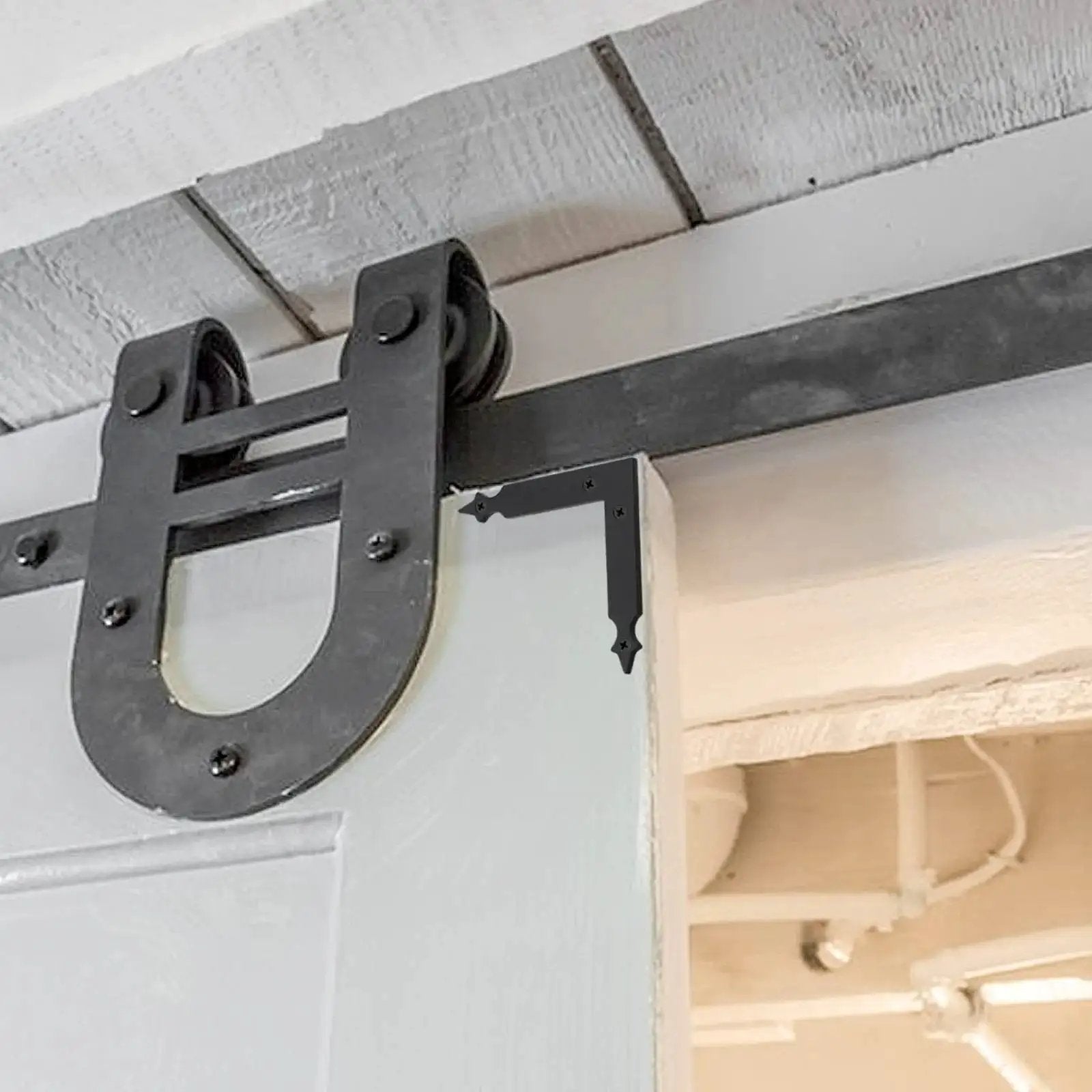 Four Piece L Shaped Corner Brackets Set In Black Carbon Steel For Sliding Barn Doors And Farmhouse Decor Ideal For Garages Gates Shutters Furniture Mirrors Frames And Garden Gates Durable Anti Rust Finish 4.92 Inch Size installed on barn door