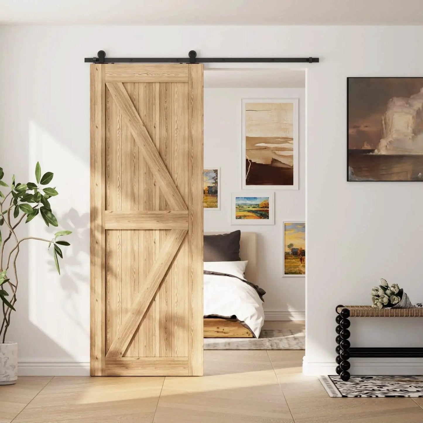 6.6Ft Sliding Track Barn Door Hardware Kit For Single Wood Door Heavy Duty T Shaped Style Black Space Saving Interior Door System For Home DIY Ideal For Kitchen Bedroom Club Pub Decor And Multi Room Opening installed on wooden door in bright room.