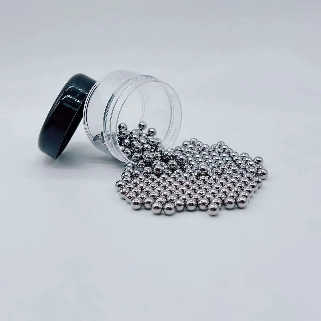 Six Millimeter Stainless Steel Bearing Balls 304 Grade G100 Precision 200 Piece Set, corrosion resistant, spilling from jar