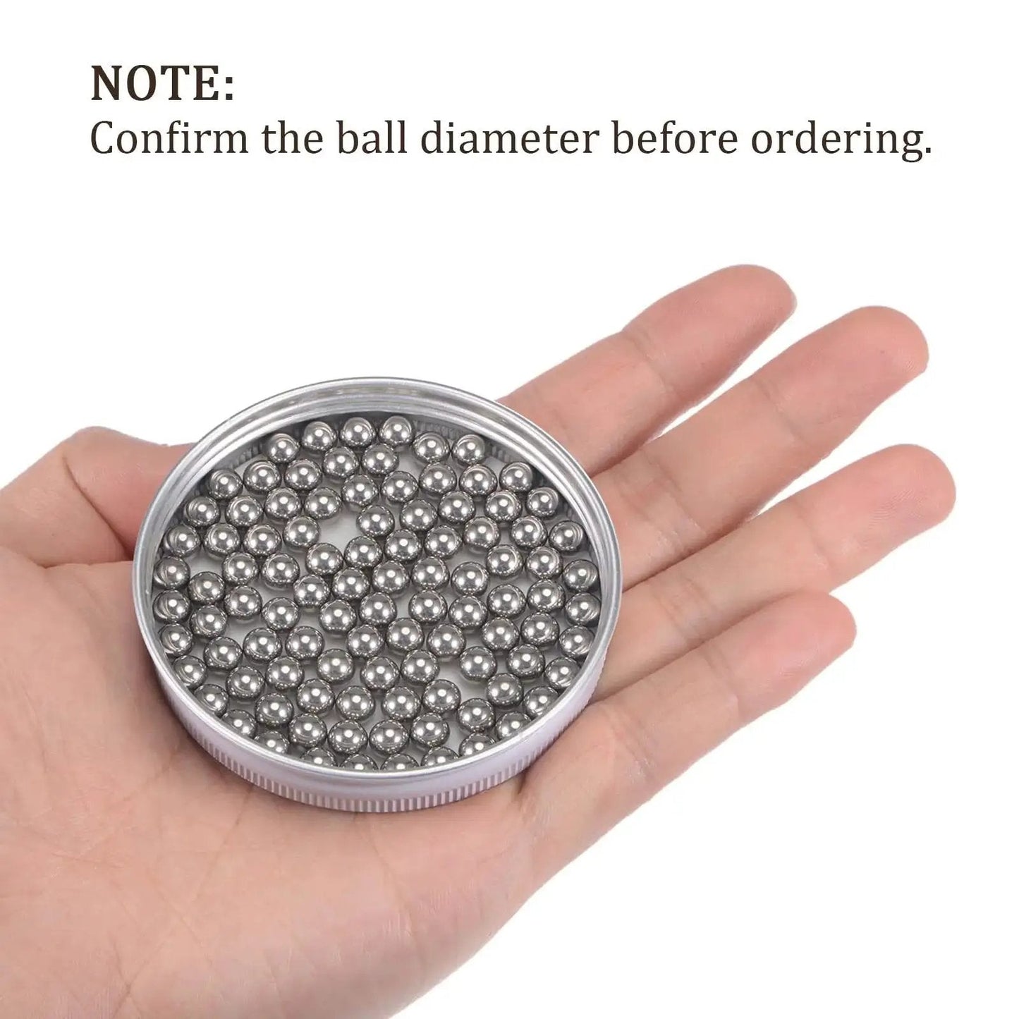 Hand holding Six Millimeter Precision Balls 304 Stainless Steel 20 Pack for bearings, turntables, drawers, mechanical projects, corrosion resistant.