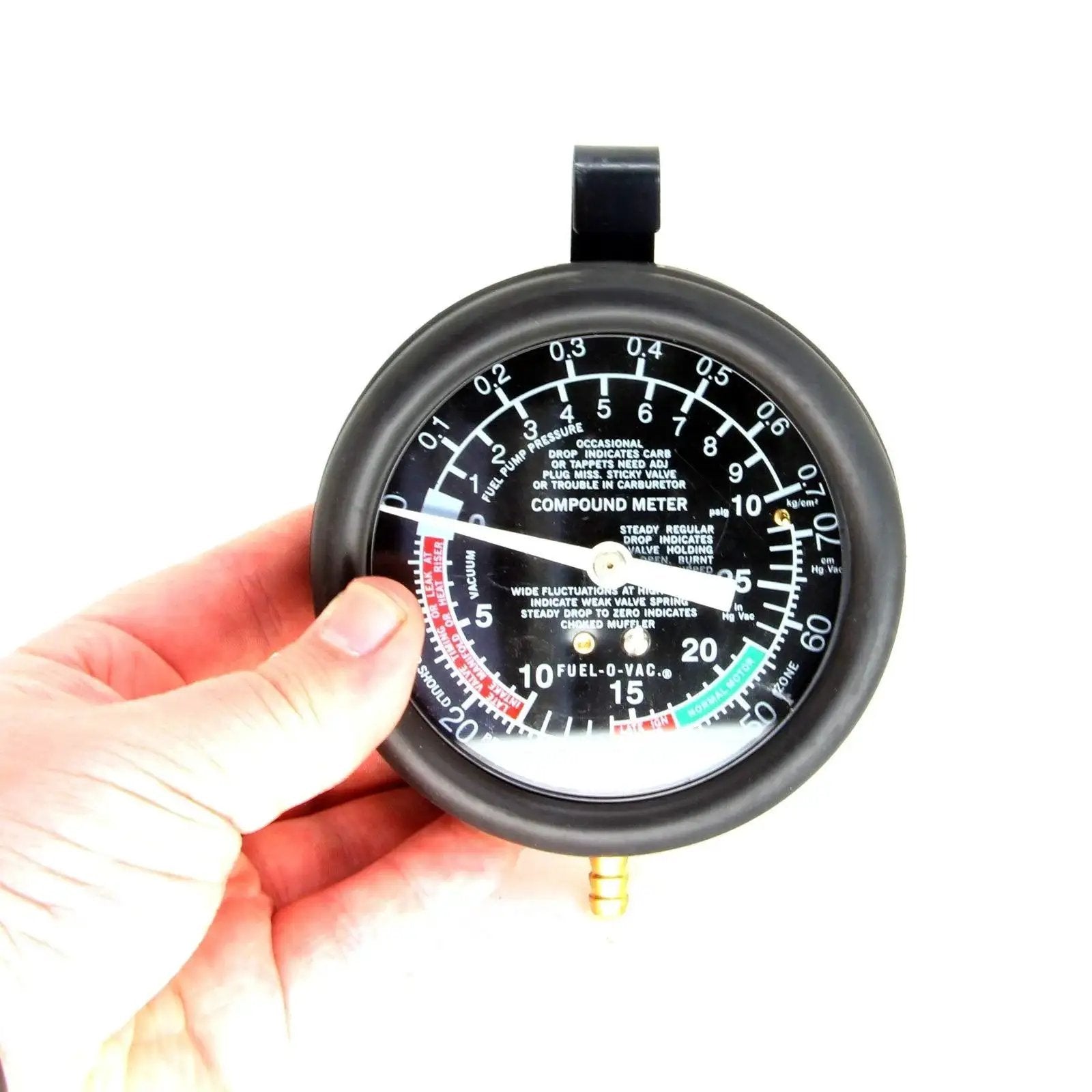 Close-up of Fuel Pump Pressure Tester Kit With Vacuum Gauge for Carburetor Valve Adjustment showing dial and hand-held operation.