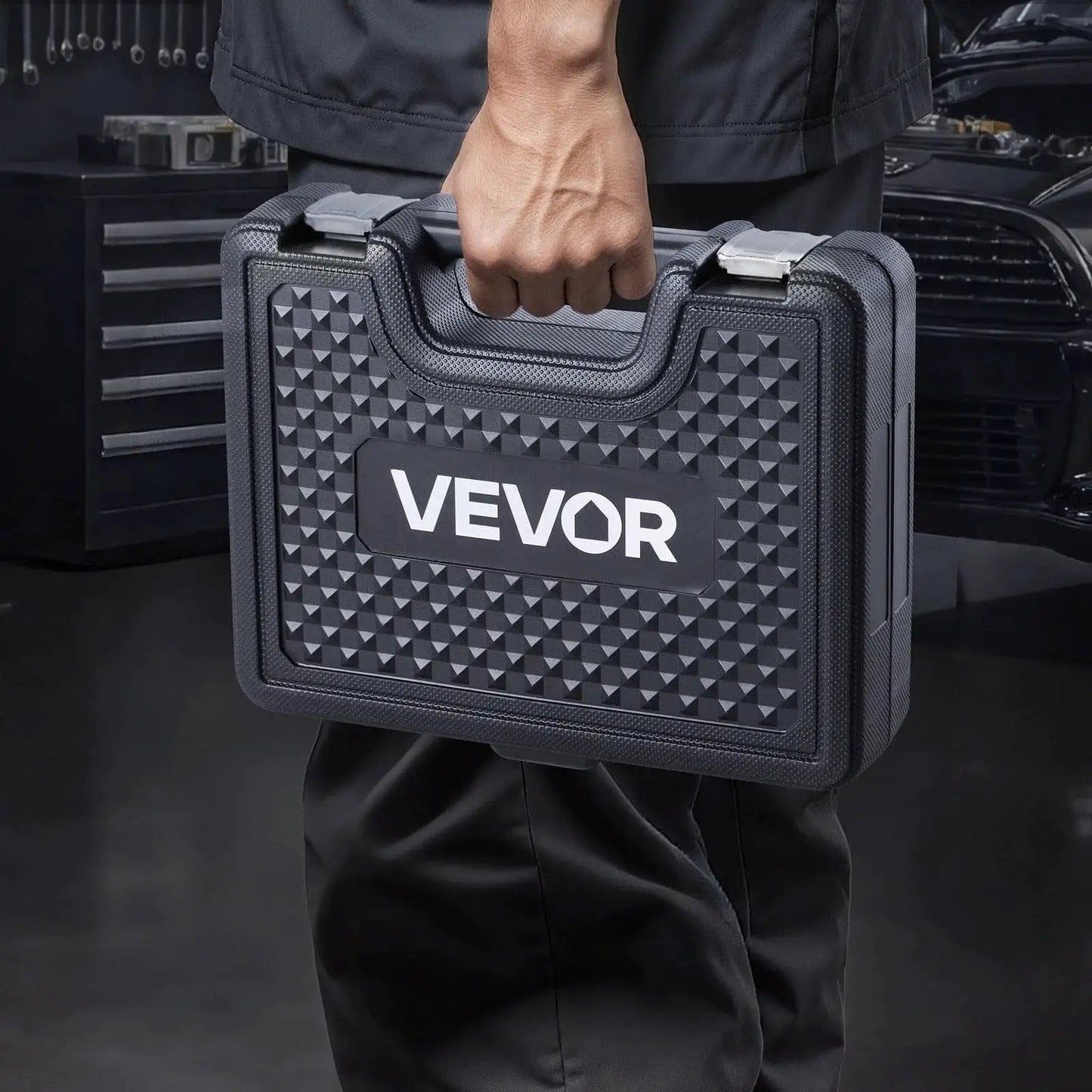 Person holding case of Bicycle Bearing Press Kit For Wheel And Hub Installation with Bushings and Wrenches 25-Piece Set