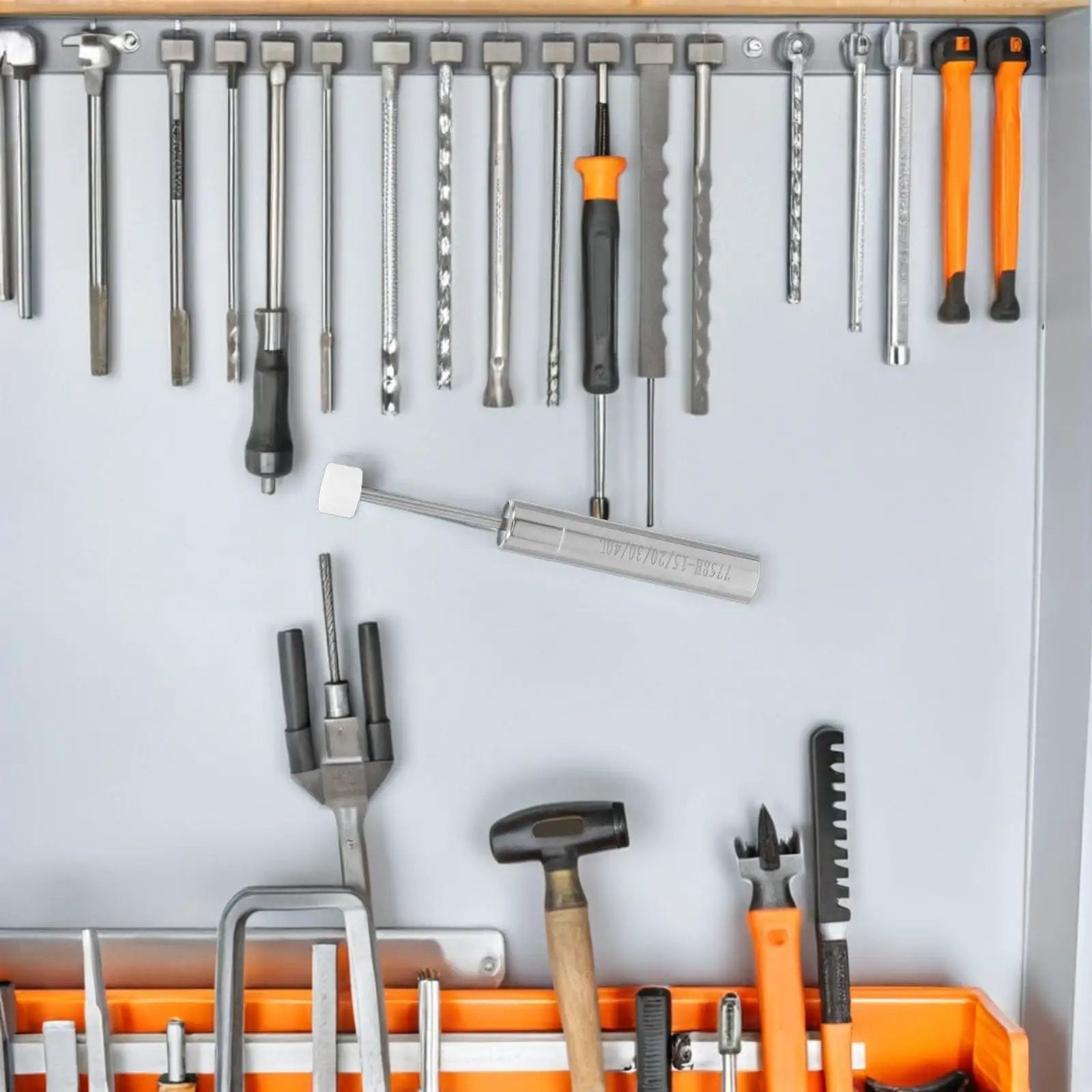 Wall-mounted tool rack with various tools and a Quiet Close Trash Can Lid Damper Kit 6 Pack 55 to 59 Newtons displayed.