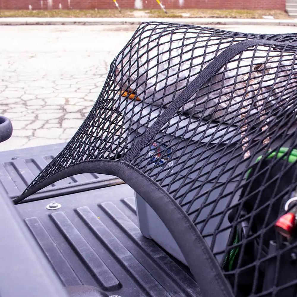 Elastic Cargo Net For Truck Bed And SUV Keeps Lightweight Loads In Place Without Tying Simple Mesh Organizer fits truck bed, close-up view.